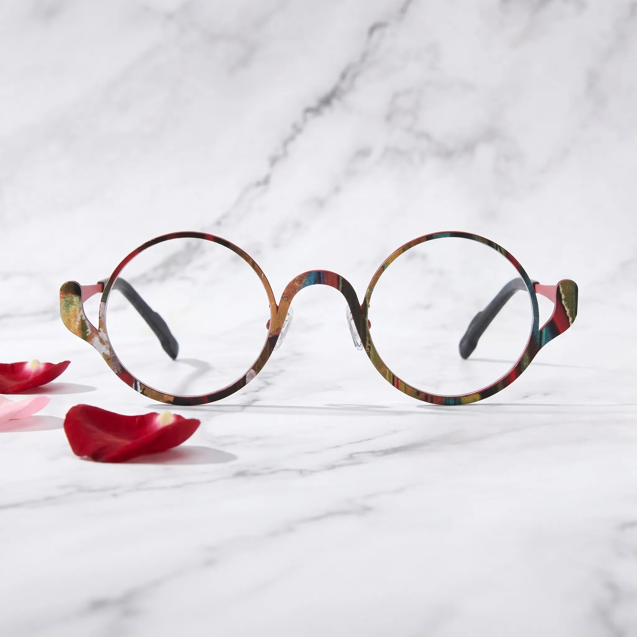 Barledear Crimson Artline eyeglasses shown in a clean lifestyle front view highlighting the artistic round pure titanium frame and modern everyday style