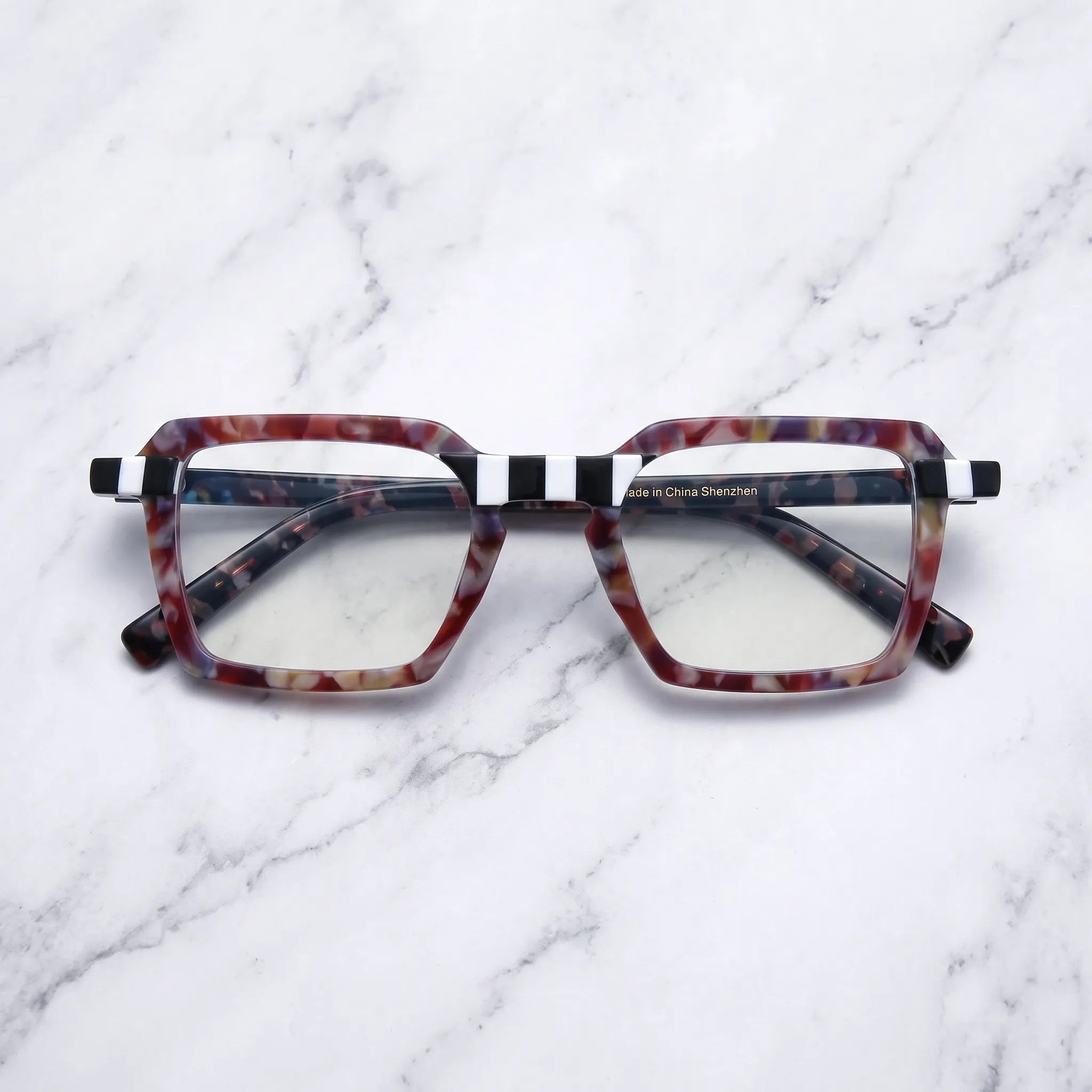 Barledear Crimson Checker Bloom eyeglasses folded display showing the red patterned frame and temples