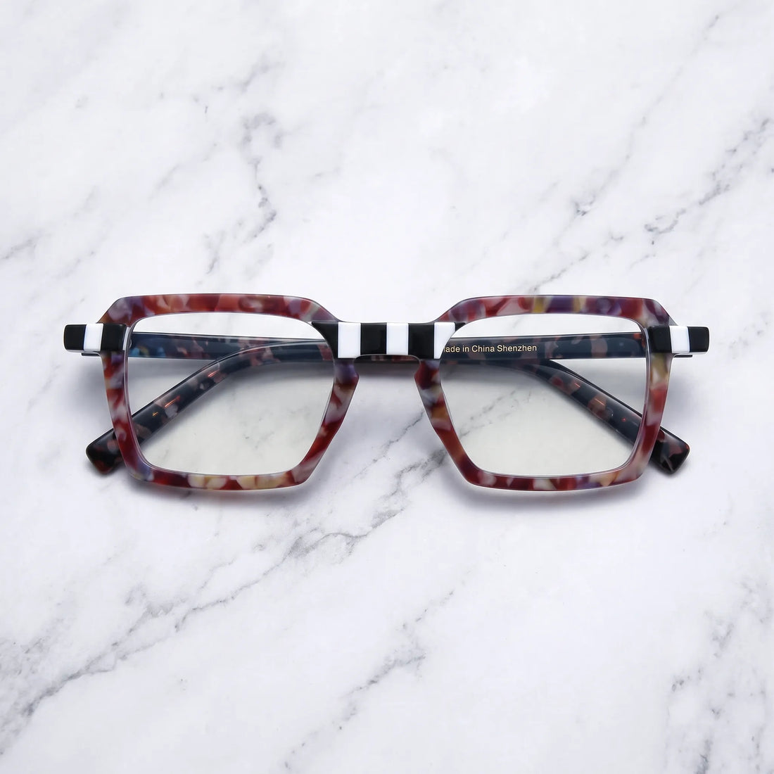 Barledear Crimson Checker Bloom eyeglasses folded display showing the red patterned frame and temples