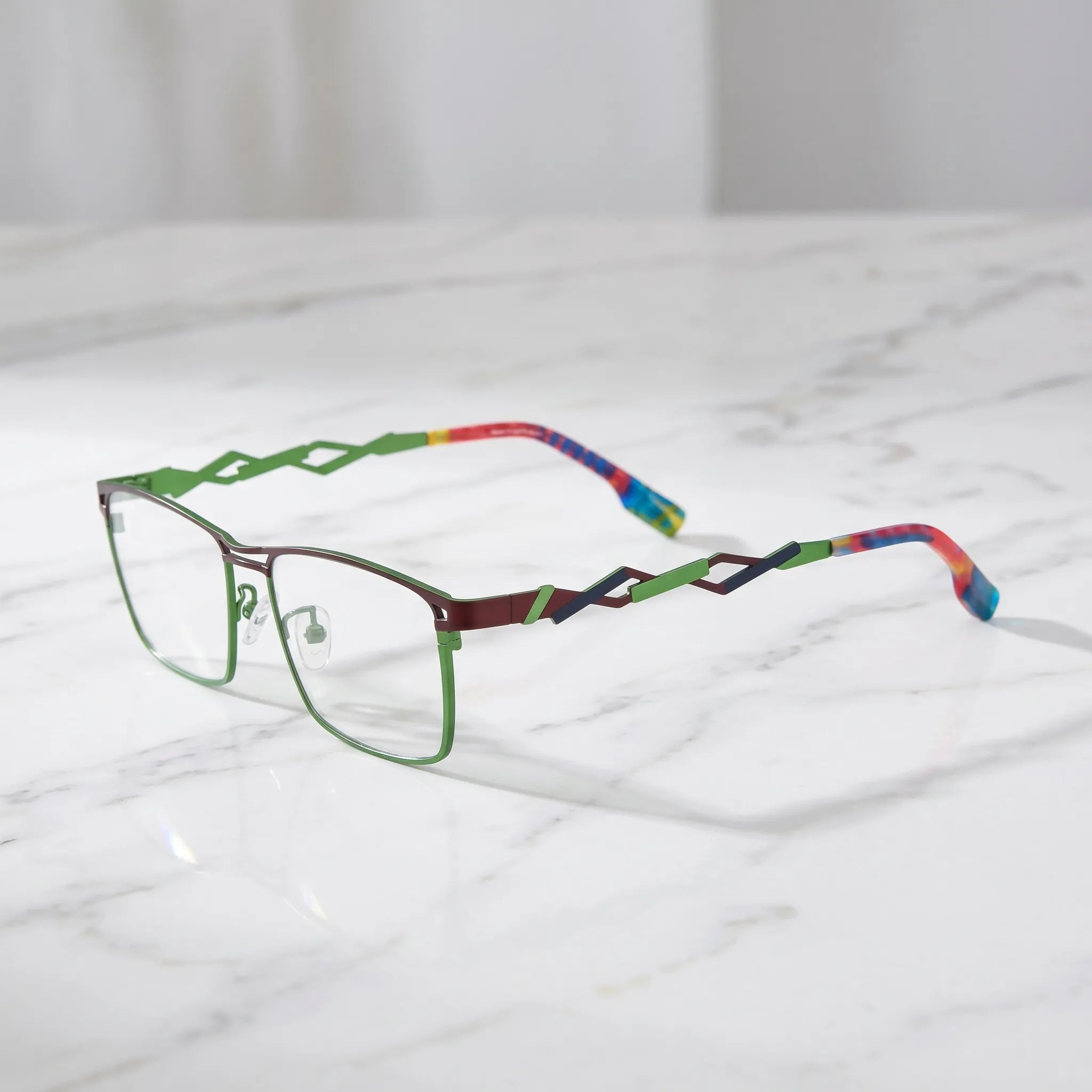 Barledear Crimson Meadow Green eyeglasses angled side view showing slim titanium structure and bold geometric temple detail