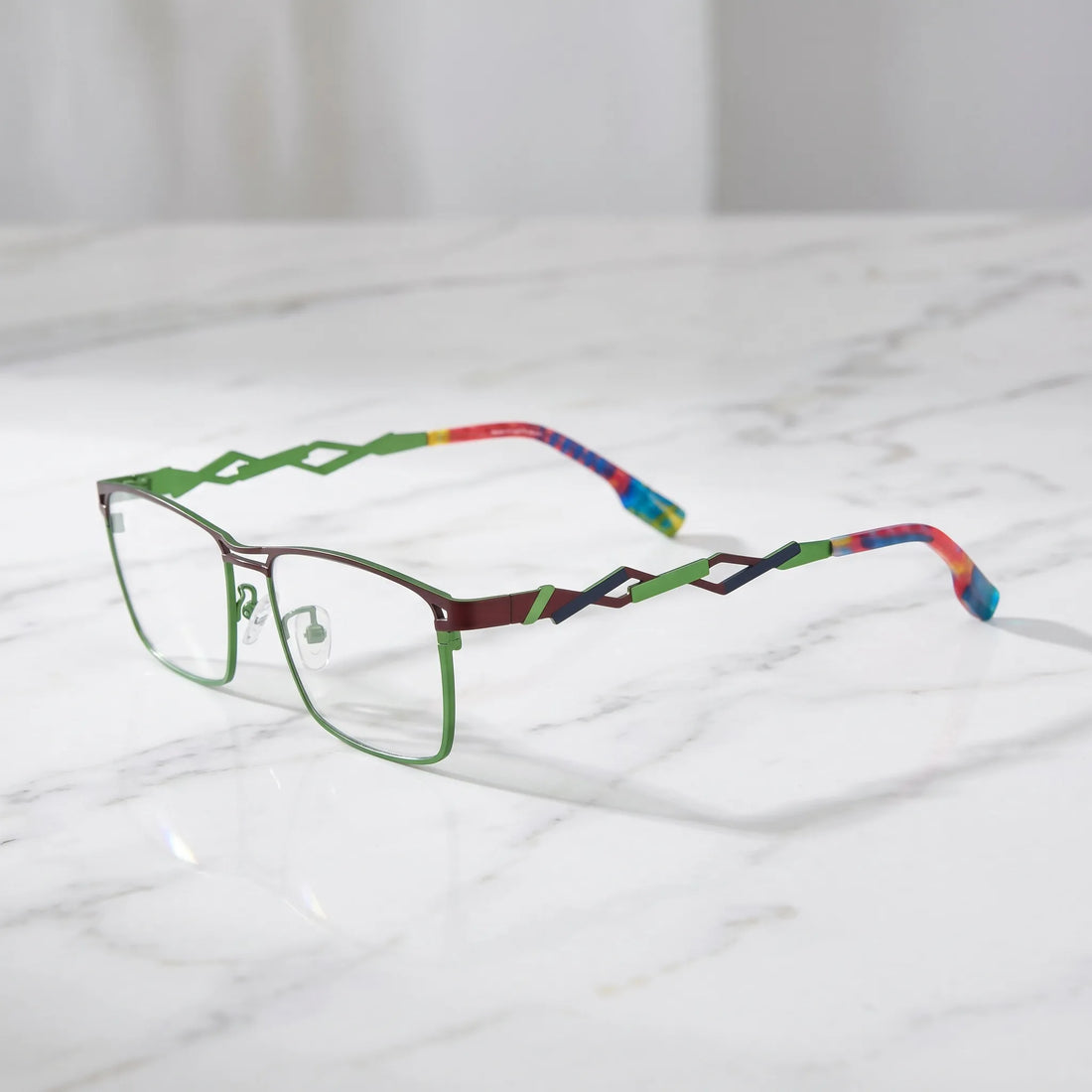 Barledear Crimson Meadow Green eyeglasses angled side view showing slim titanium structure and bold geometric temple detail
