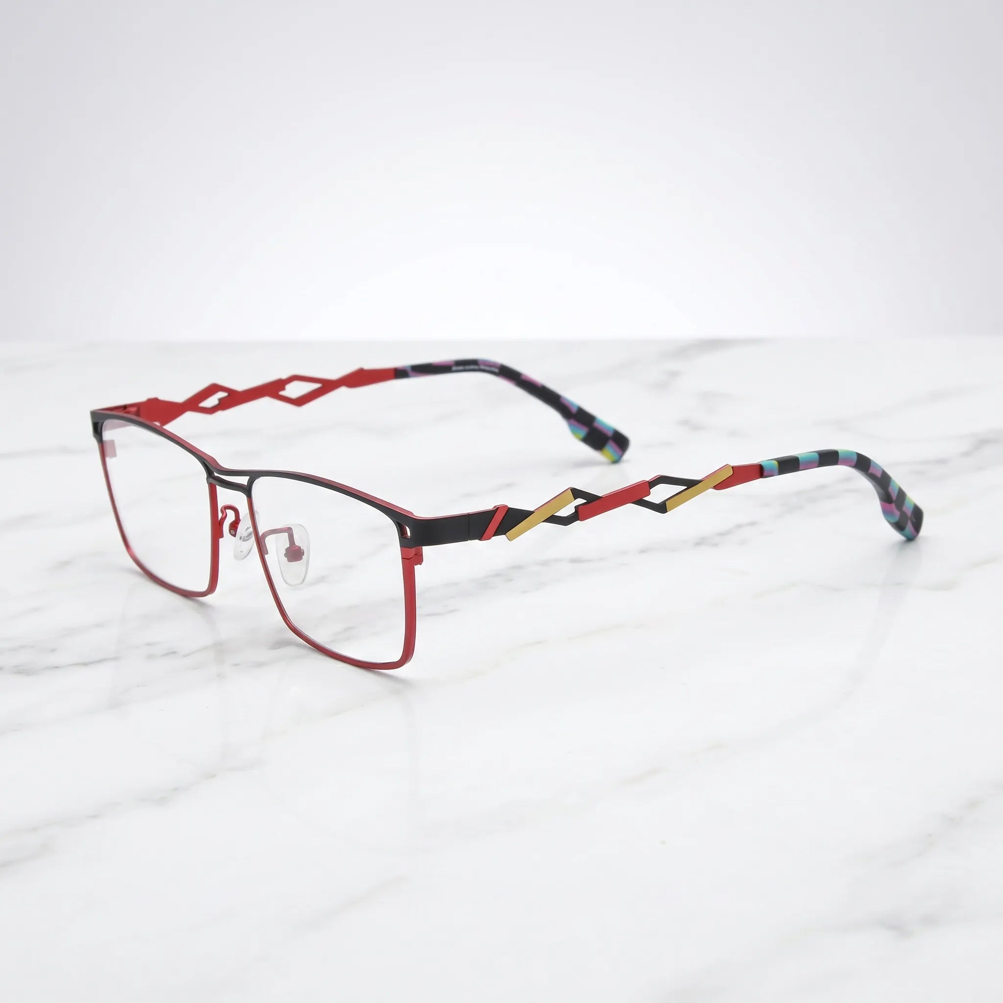 Barledear Crimson Noir eyeglasses angled side view showing hollow geometric temples, bridge detail, and lightweight construction
