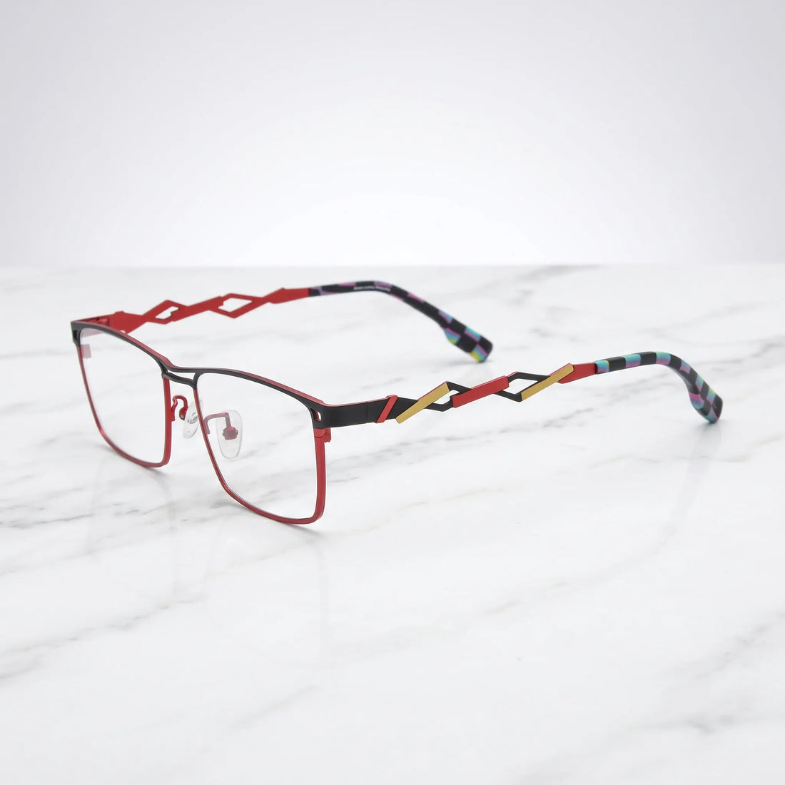 Barledear Crimson Noir eyeglasses angled side view showing hollow geometric temples, bridge detail, and lightweight construction