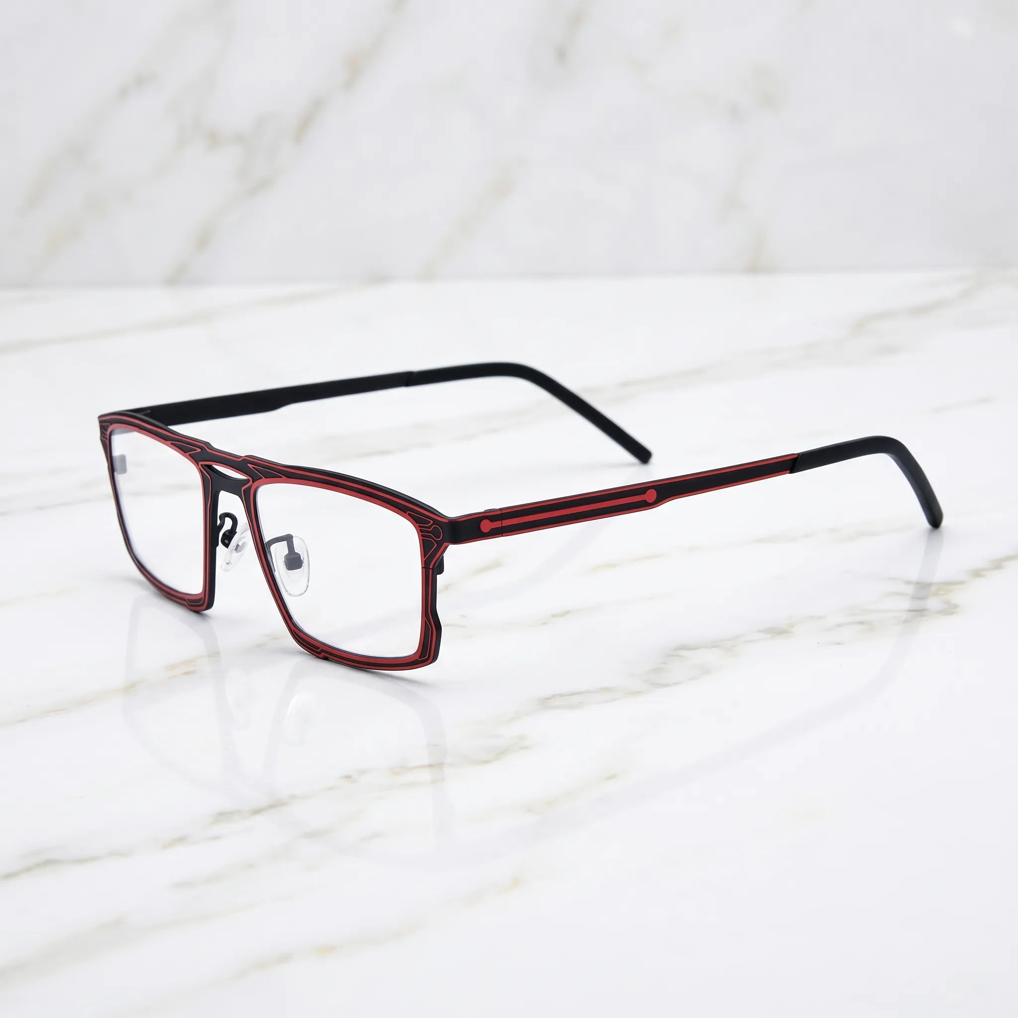 Barledear Crimson Noir eyeglasses angled side view showing slim dual-tone temples, bridge detail, and adjustable nose pads