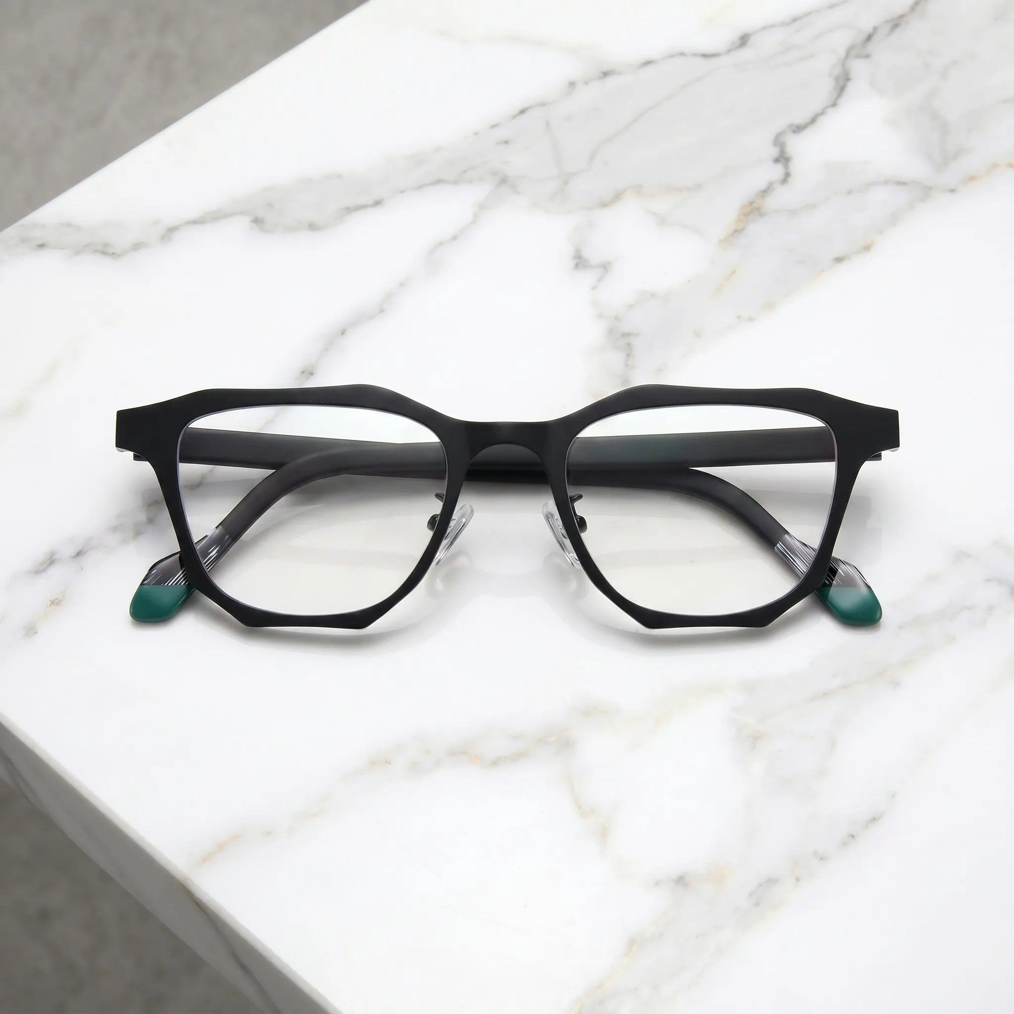 Barledear Crimson Noir eyeglasses folded display showing red-accent temples and modern geometric frame design