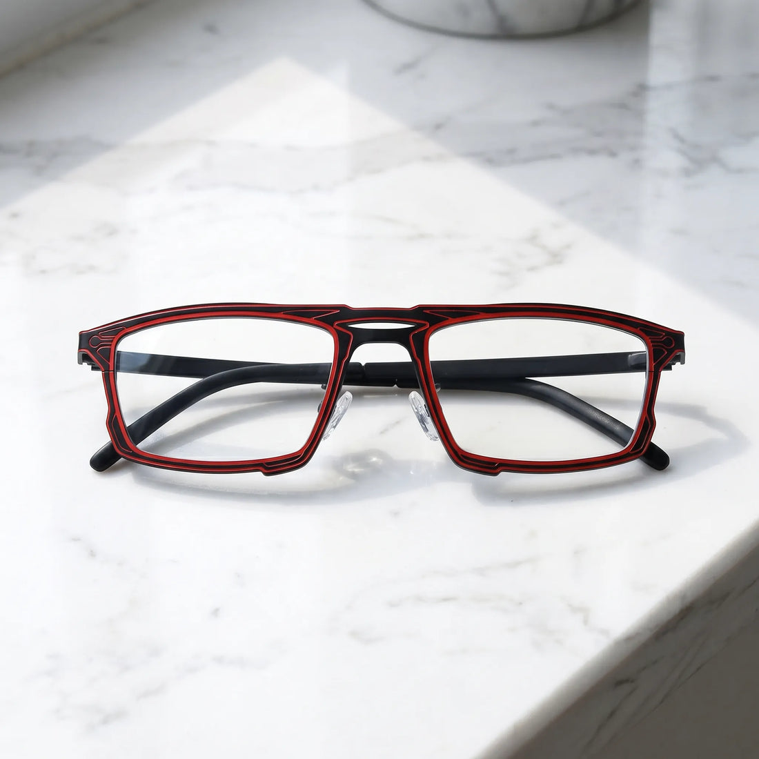 Barledear Crimson Noir eyeglasses folded display showing slim titanium frame and temple design