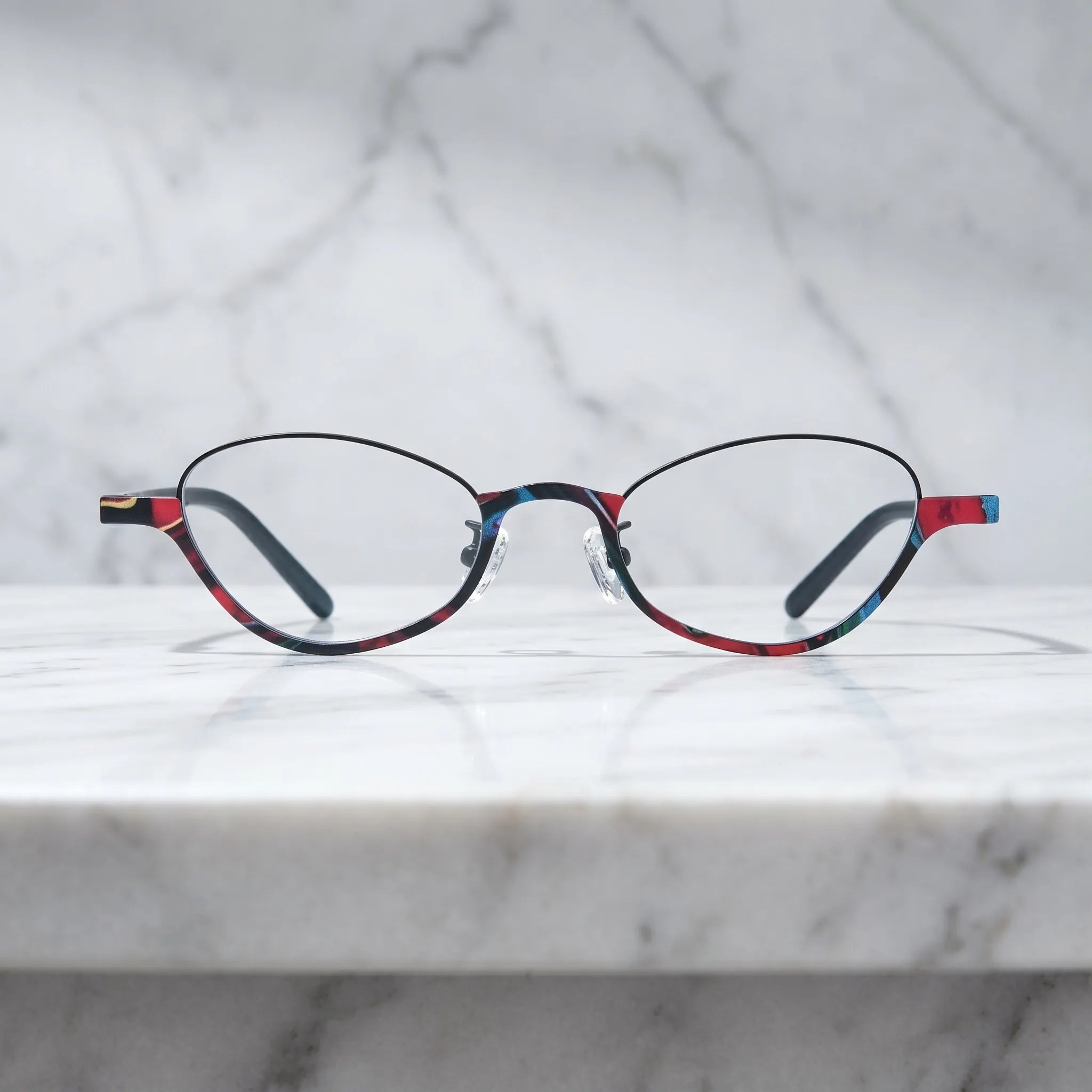 Barledear Crimson Noir oval titanium eyeglasses shown in a clean lifestyle front view with slim full-rim frame design
