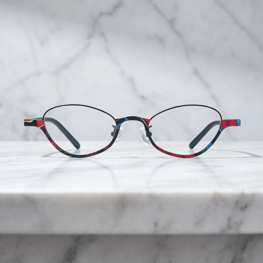 Barledear Crimson Noir oval titanium eyeglasses shown in a clean lifestyle front view with slim full-rim frame design