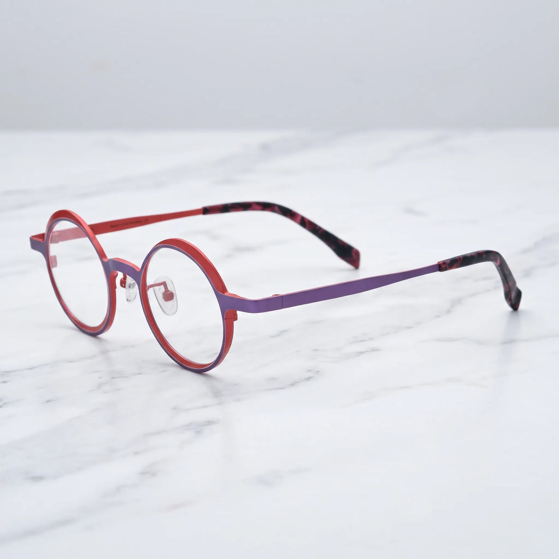 Barledear Crimson Violet round pure titanium eyeglasses angled side view showing slim temples bridge construction and patterned temple tips