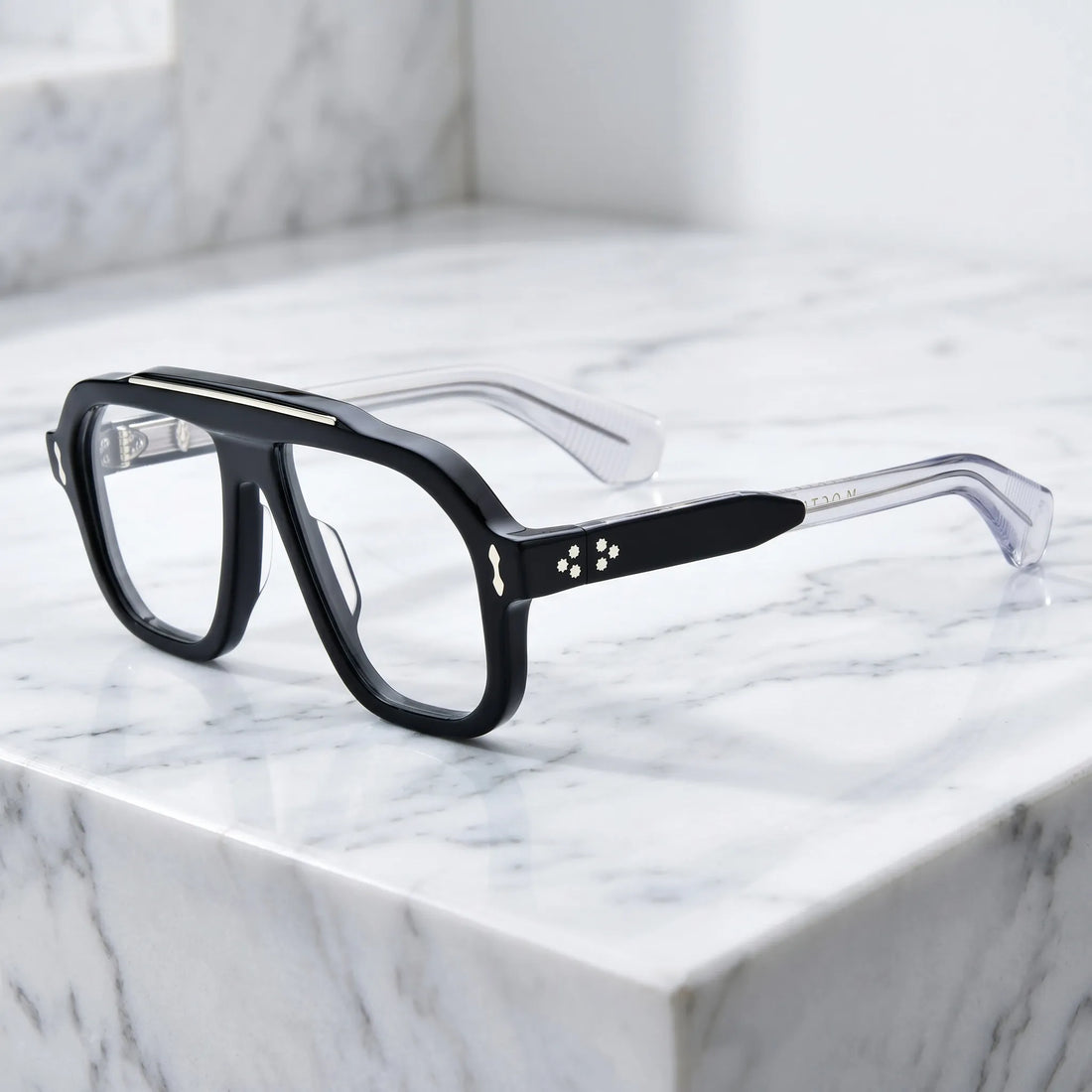 Barledear Crystal Noir eyeglasses angled side view showing clear temples, black acetate temple accents, silver-tone inlays and screw hinges