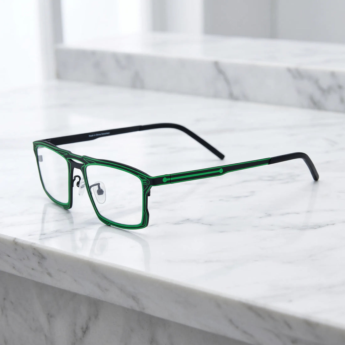 Barledear Electric Ivy Black eyeglasses angled side view showing slim dual-tone temples, bridge detail, and adjustable nose pads