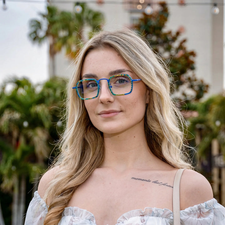 Model wearing Barledear Electric Mosaic Blue eyeglasses in a lifestyle portrait