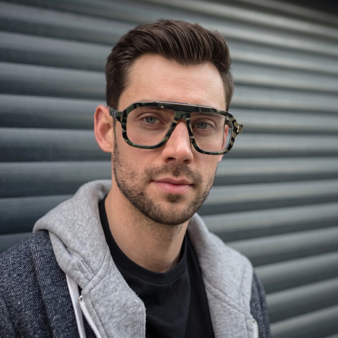 Adult model wearing Barledear Field Camo Green square aviator acetate eyeglasses for a bold urban camouflage look