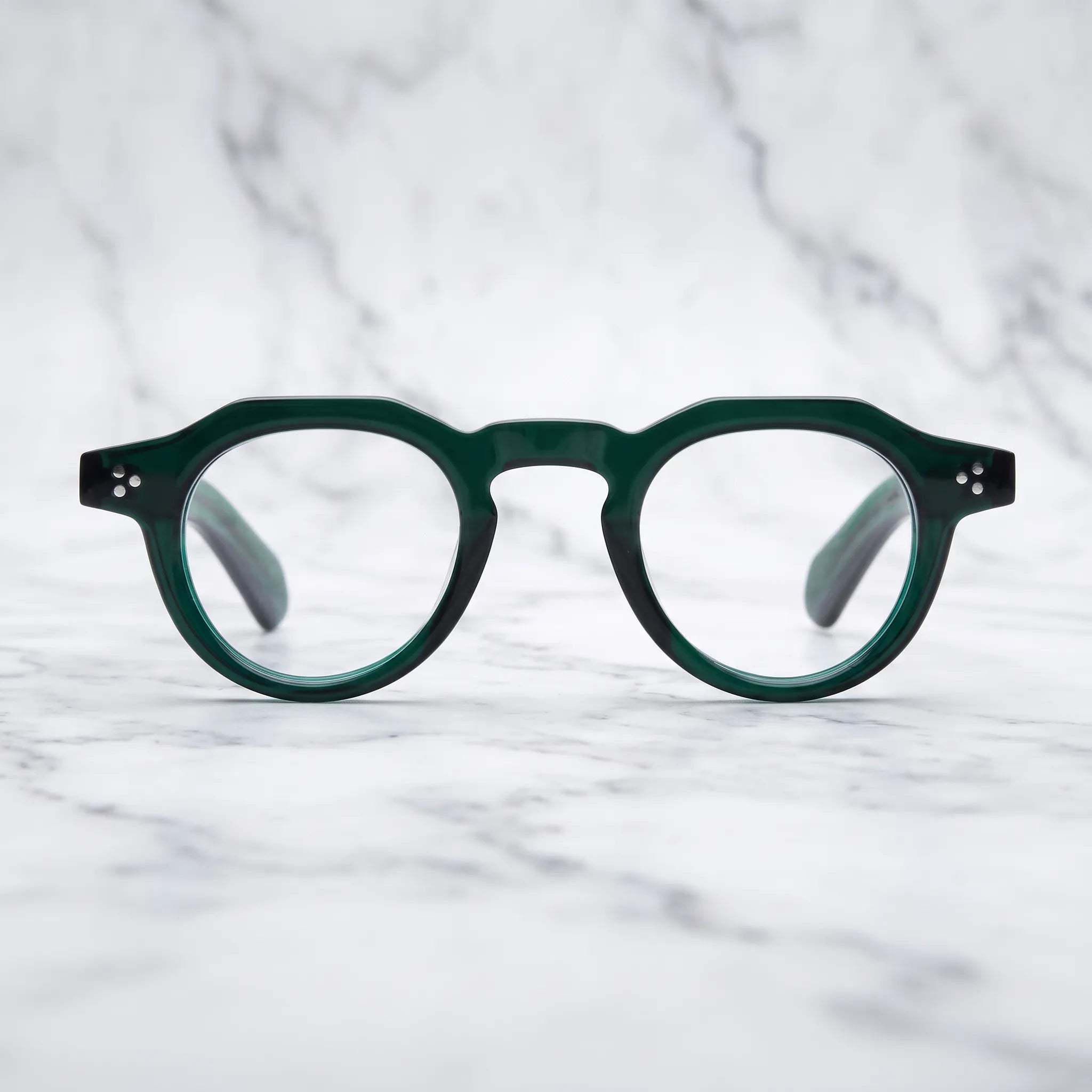 Barledear Forest Emerald retro geometric acetate eyeglasses showing the polished emerald acetate frame in a clean lifestyle setting