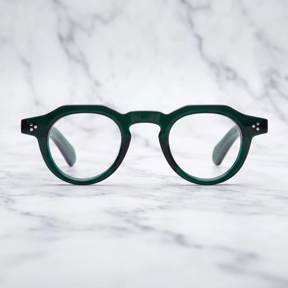 Barledear Forest Emerald retro geometric acetate eyeglasses showing the polished emerald acetate frame in a clean lifestyle setting