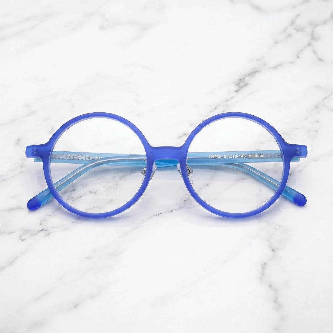 Barledear Frosted Iris Blue round acetate eyeglasses folded display showing frame shape, slim temples, and contrast blue temple tips