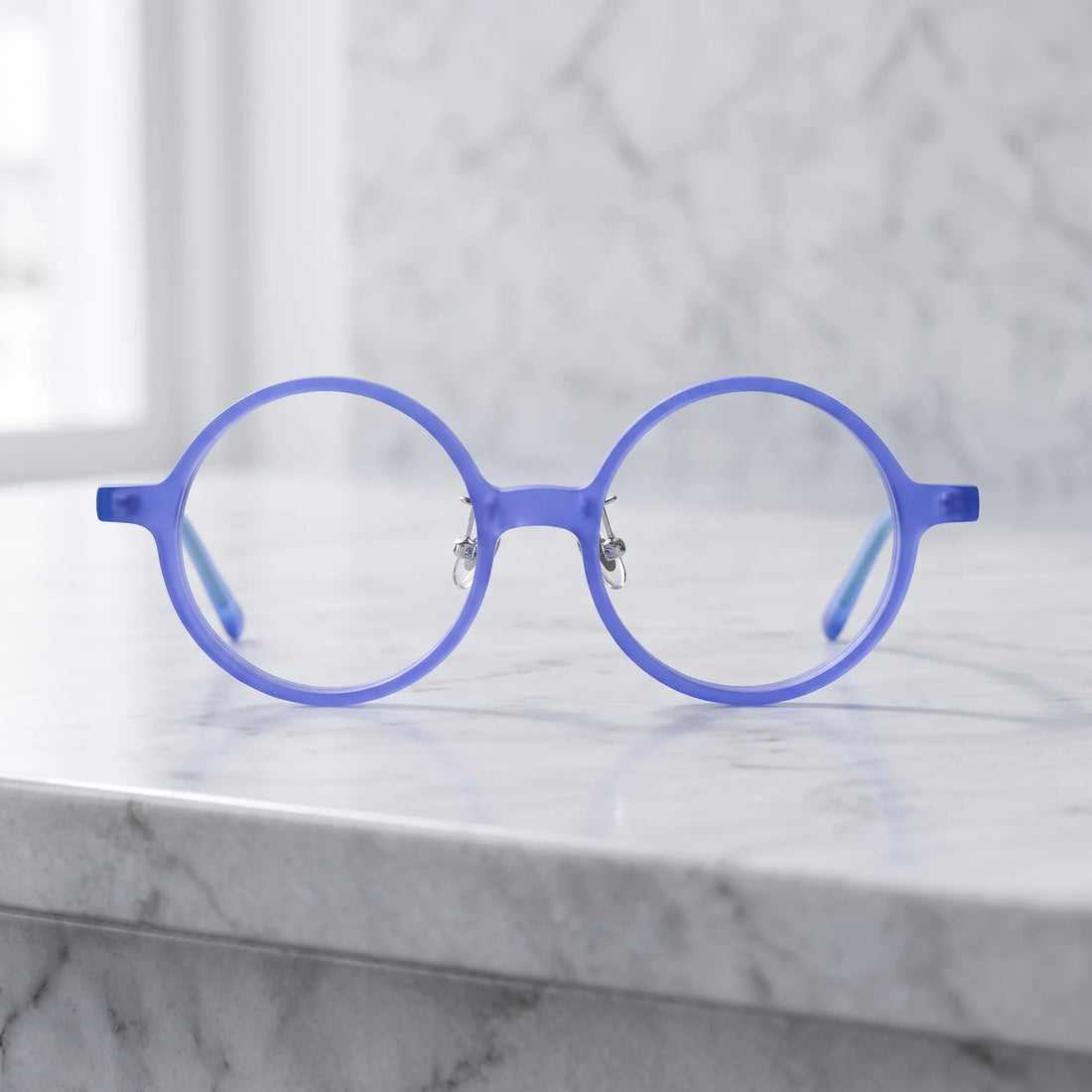 Barledear Frosted Iris Blue round acetate eyeglasses shown in a clean lifestyle front view with blue frame and light blue temples