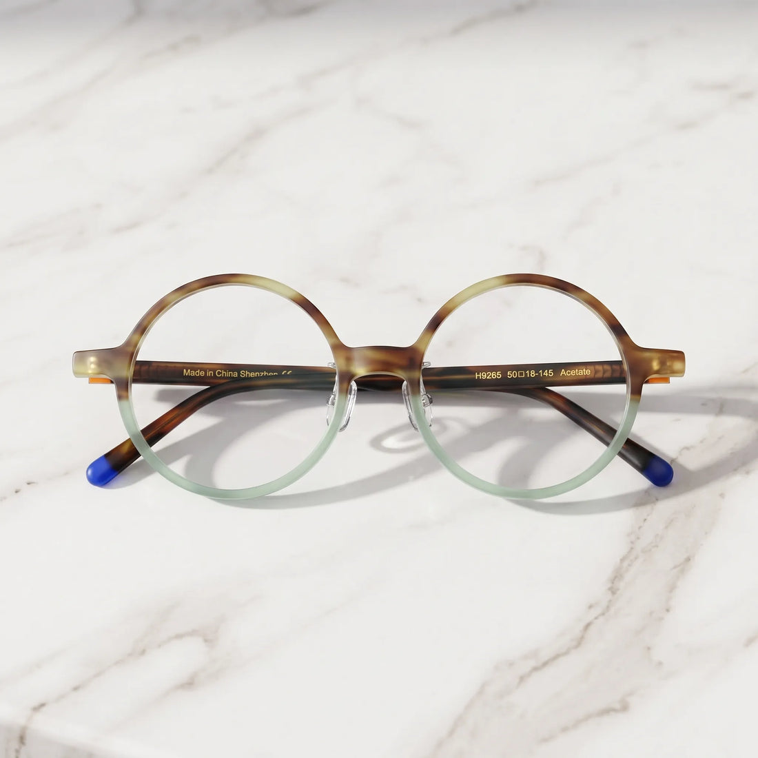 Barledear Frosted Sage Tortoise round acetate eyeglasses folded display showing frame shape, slim temples, and contrast temple tips