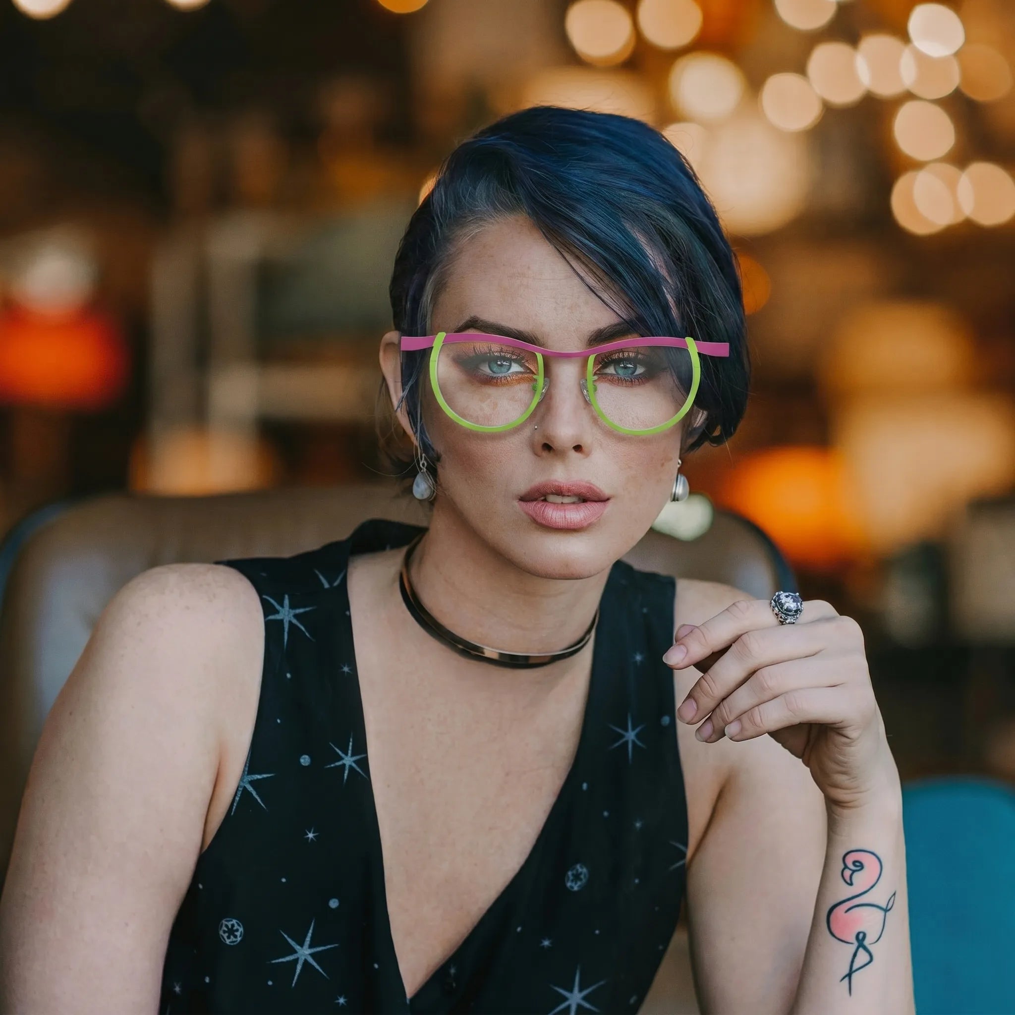 Model wearing Barledear Fuchsia Lime Noir eyeglasses in a lifestyle portrait