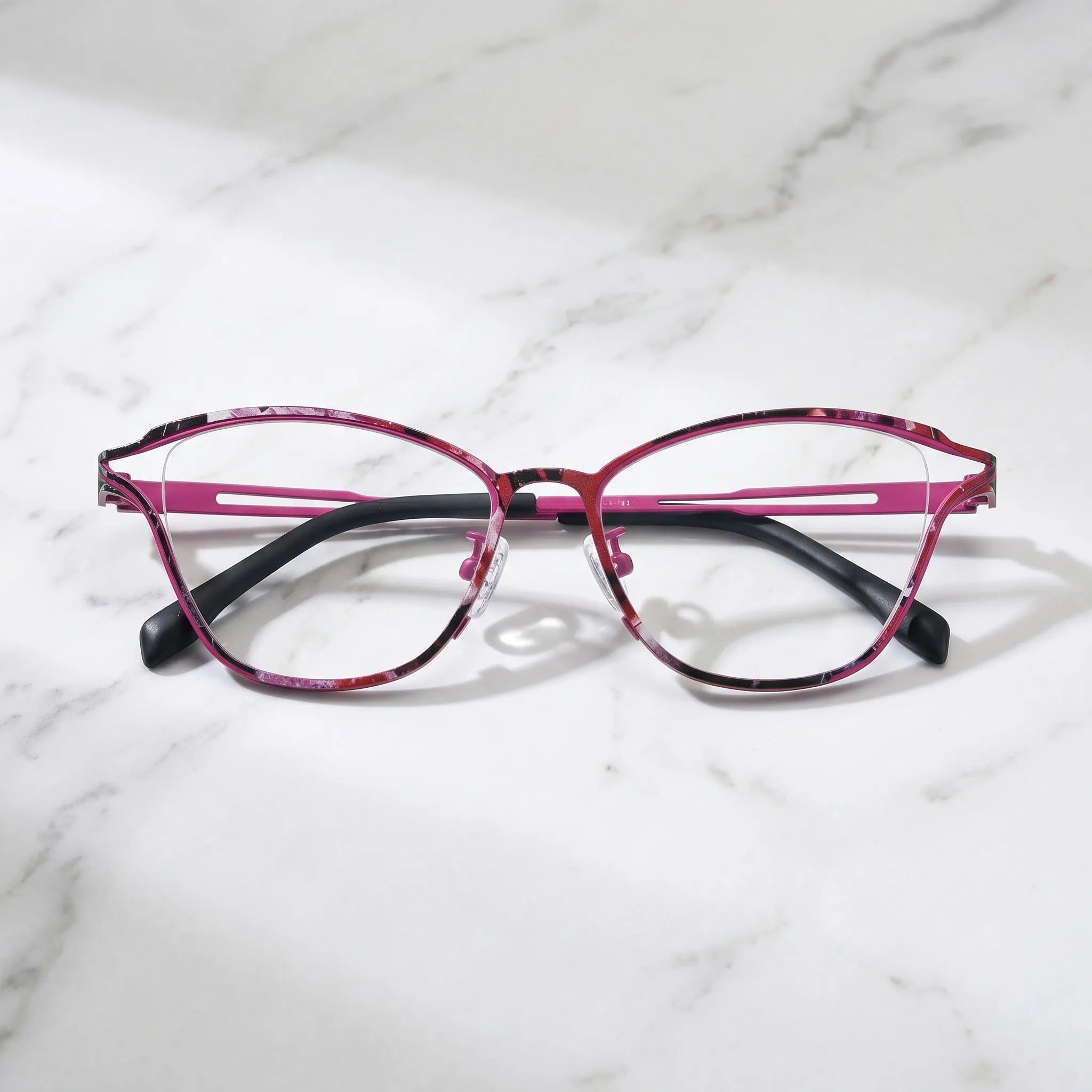 Barledear Fuchsia Mosaic eyeglasses folded display showing slim titanium frame and black temple tips