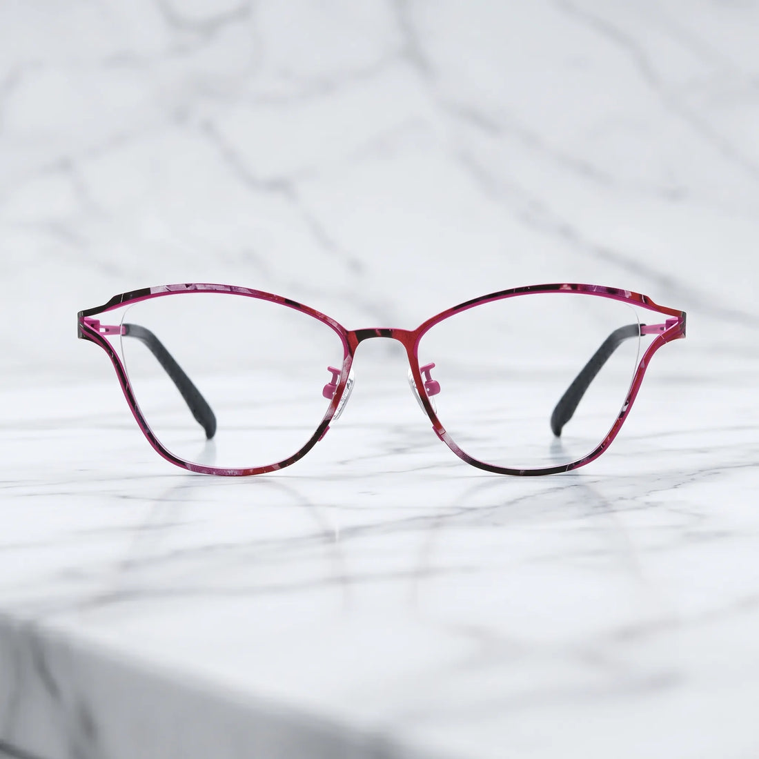 Barledear Fuchsia Mosaic eyeglasses shown in a clean lifestyle front view with pink mosaic titanium frame detail