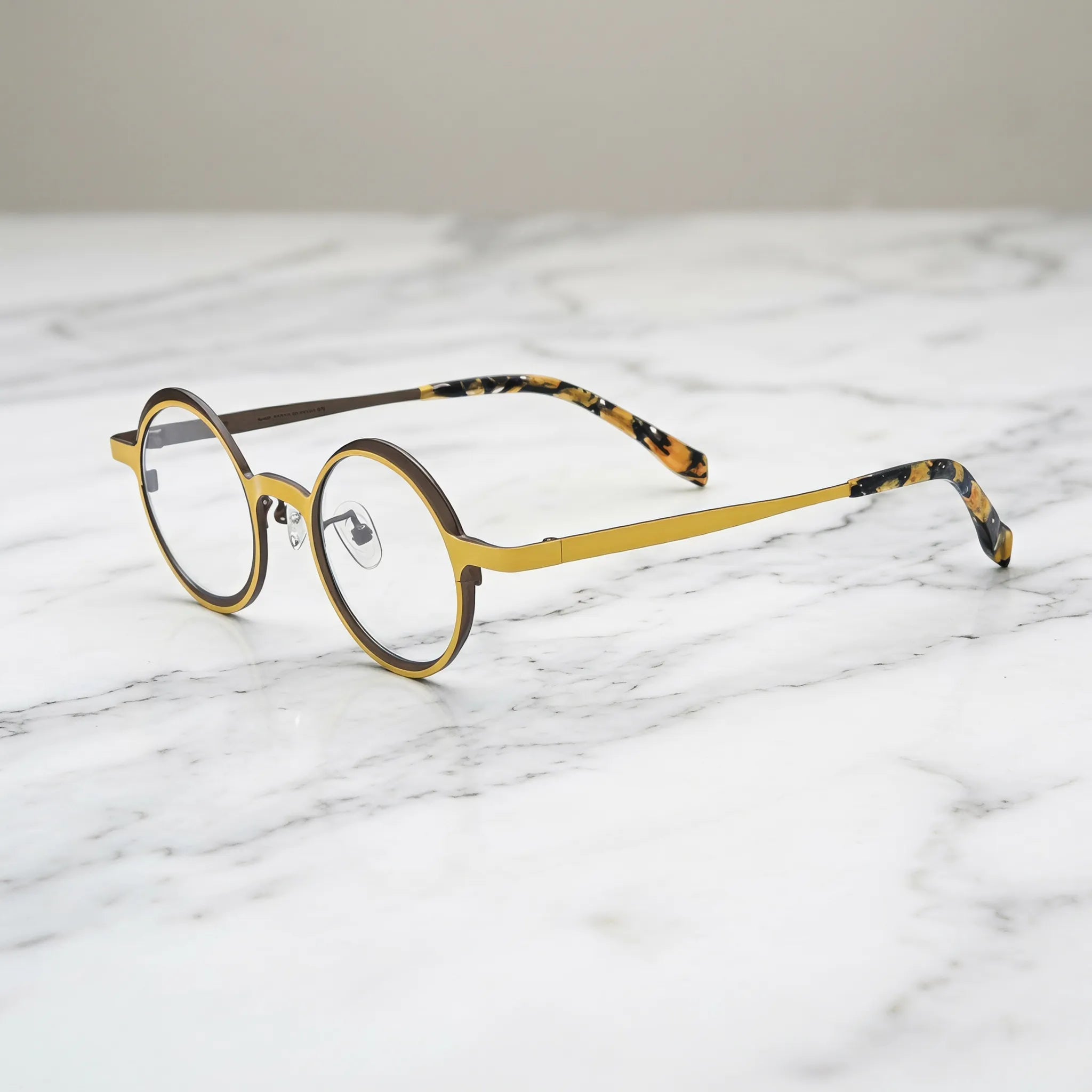 Barledear Golden Walnut round pure titanium eyeglasses angled side view showing slim temples bridge construction and patterned temple tips