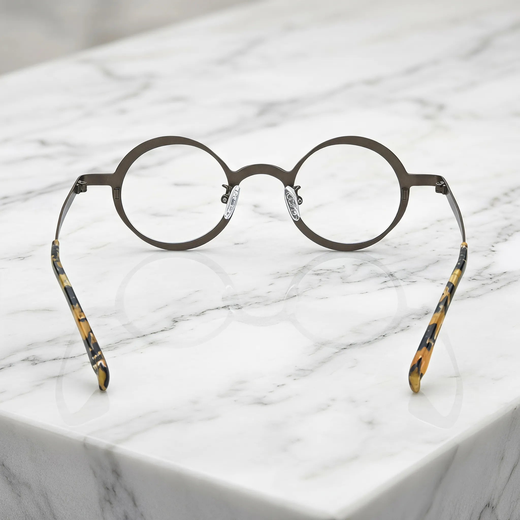 Barledear Golden Walnut round pure titanium eyeglasses back view showing the full-rim structure adjustable silicone nose pads and temple shape