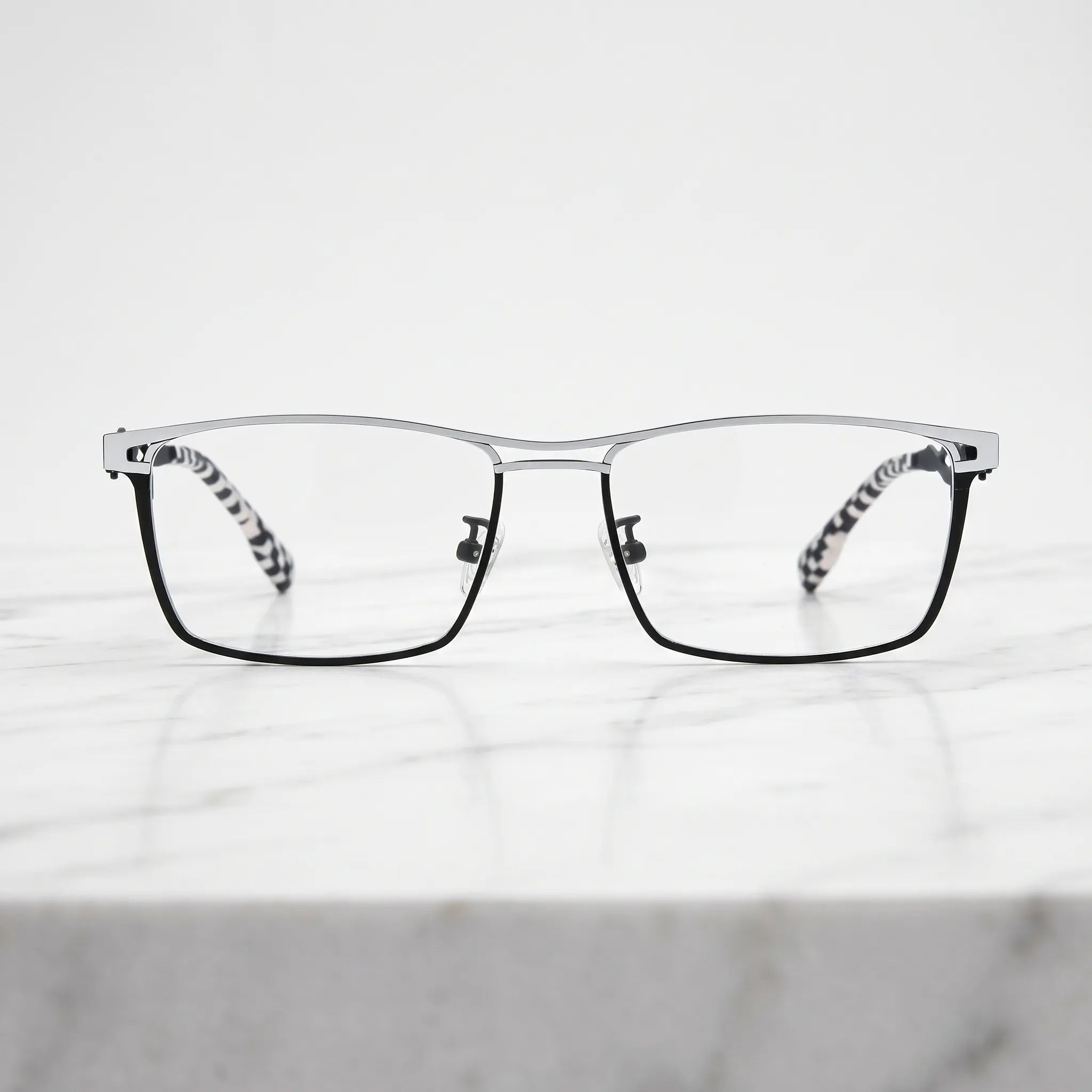 Barledear Graphite Gunmetal eyeglasses shown in a clean lifestyle front view with minimalist titanium styling