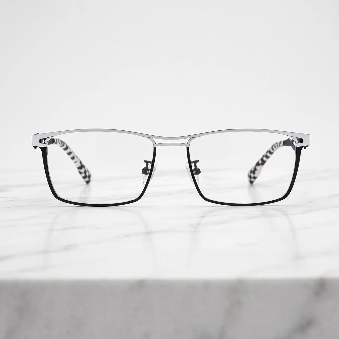 Barledear Graphite Gunmetal eyeglasses shown in a clean lifestyle front view with minimalist titanium styling