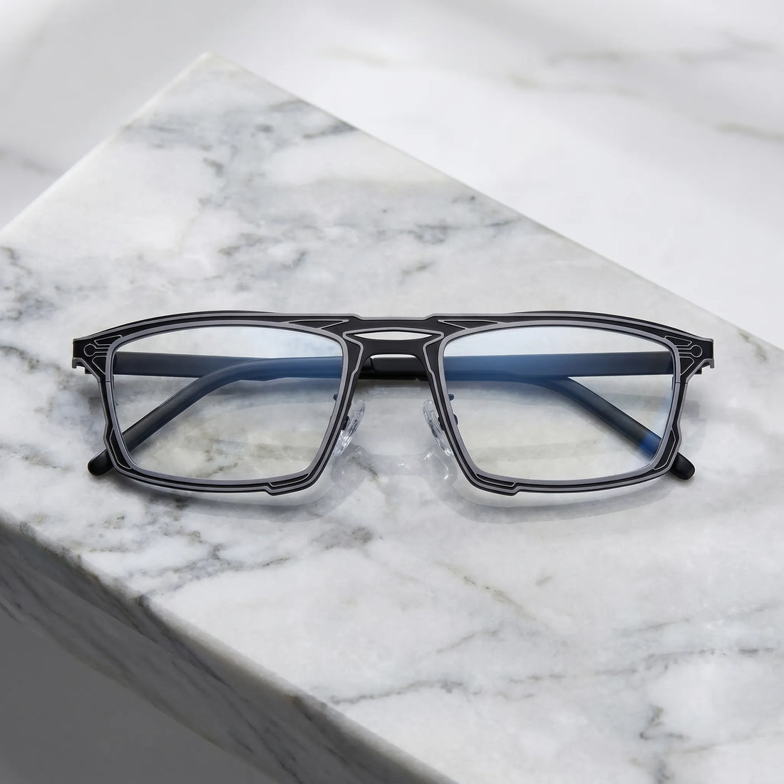Barledear Graphite Noir eyeglasses folded display showing slim titanium frame and temple design