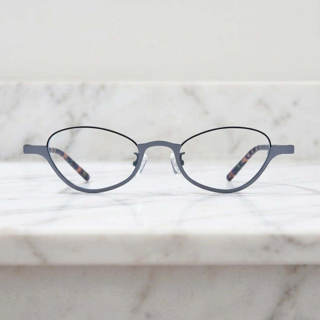 Barledear Graphite Tortoise eyeglasses shown in a clean lifestyle front view with modern gray oval frame