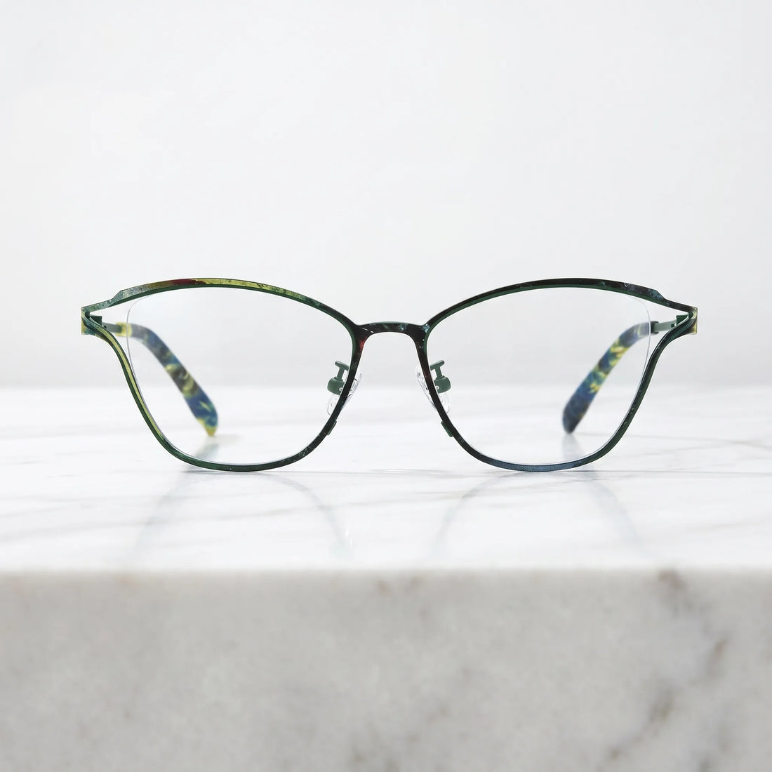Barledear Green Mosaic eyeglasses shown in a clean lifestyle front view with colorful titanium frame detail