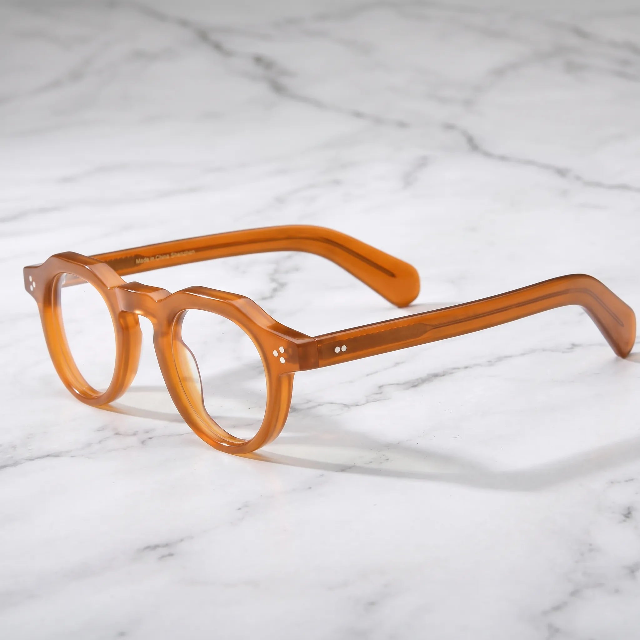 Barledear Honey Amber retro geometric acetate eyeglasses showing the keyhole bridge, rivet accents, and warm translucent finish
