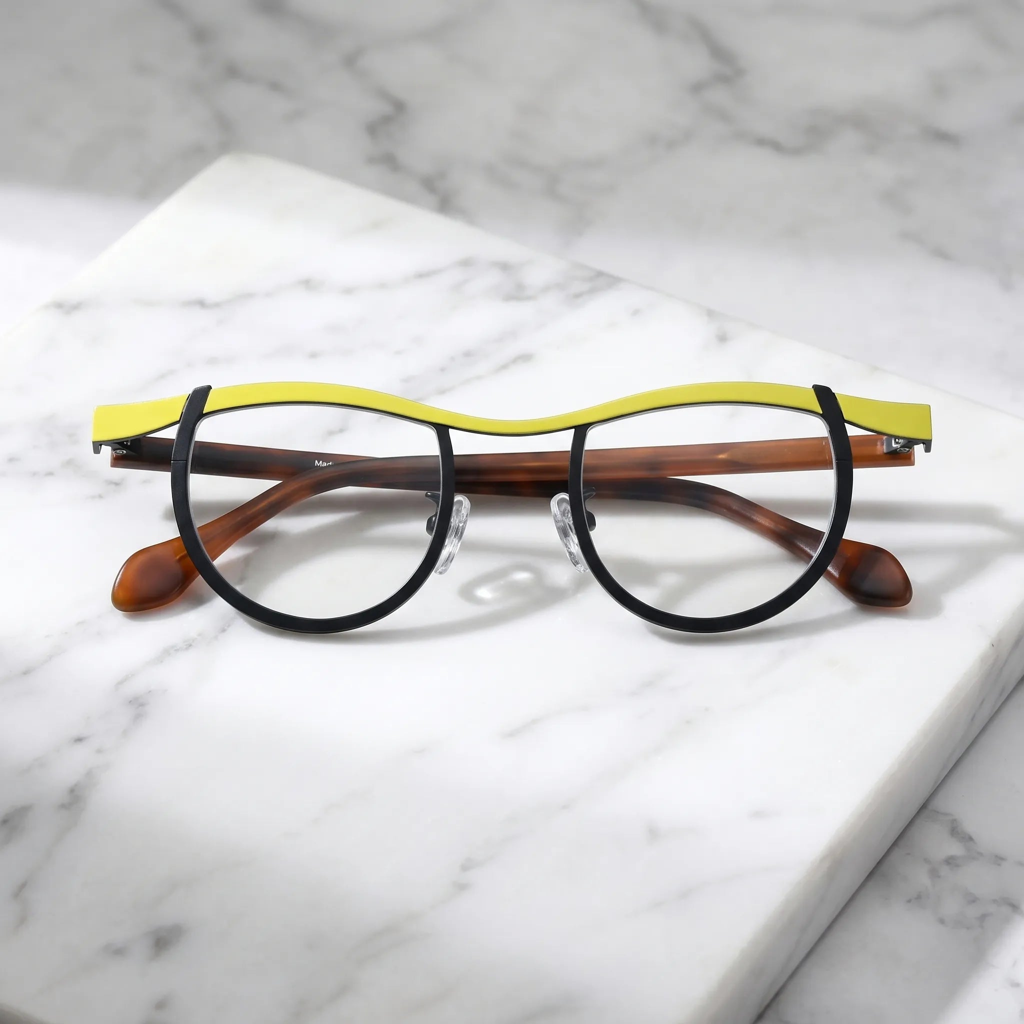Barledear Lemon Noir Amber eyeglasses folded display showing frame and temple design