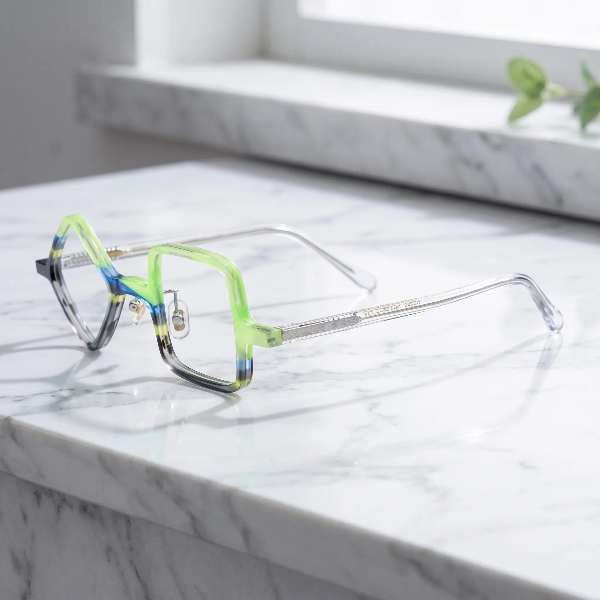 Barledear Lime Smoke asymmetric geometric acetate eyeglasses angled side view showing the lime and smoke frame pattern, metal hinges, and clear temples with visible internal cores.