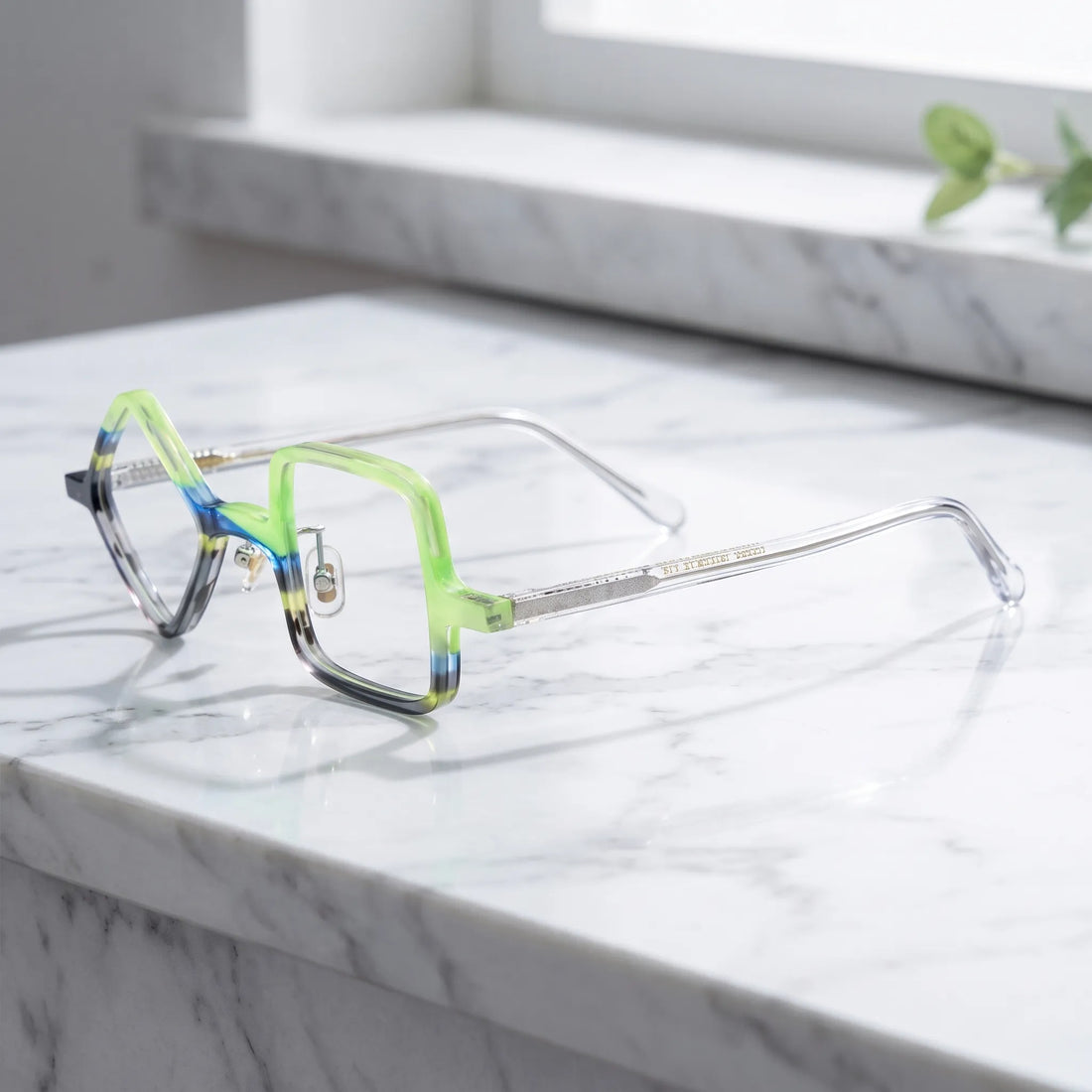 Barledear Lime Smoke asymmetric geometric acetate eyeglasses angled side view showing the lime and smoke frame pattern, metal hinges, and clear temples with visible internal cores.