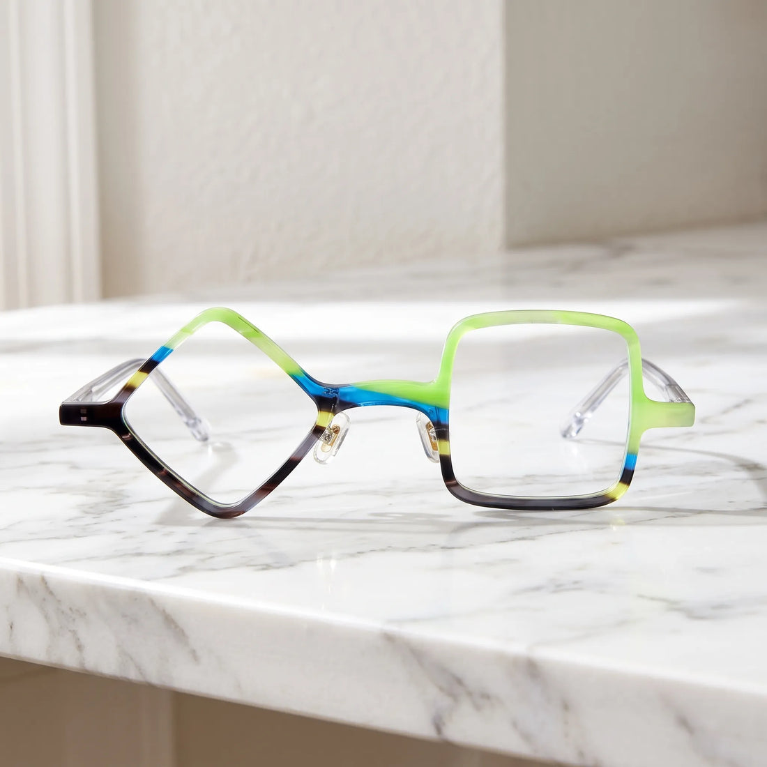 Barledear Lime Smoke asymmetric geometric acetate eyeglasses shown in a clean lifestyle front display with translucent green accents and crystal-clear temples.