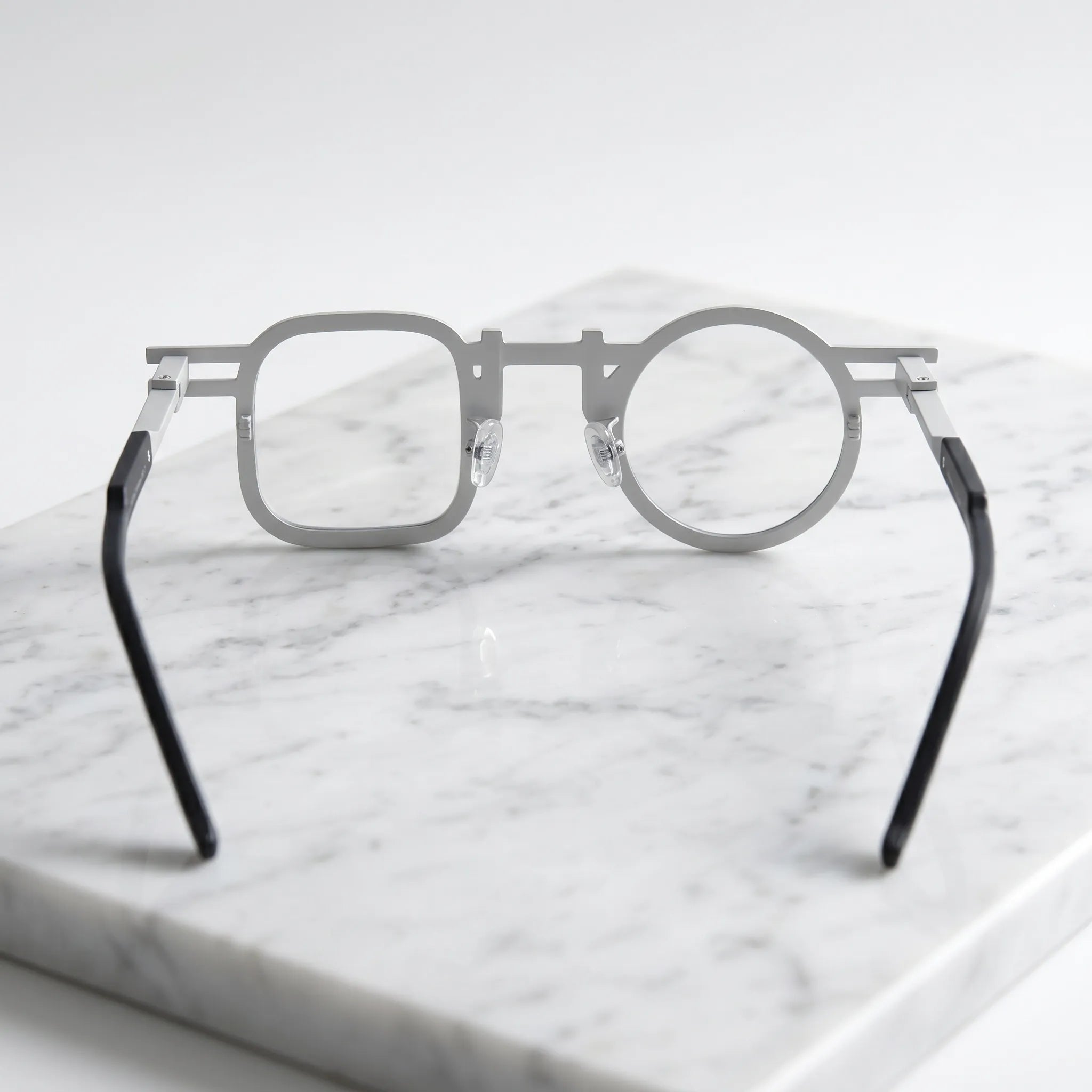Barledear Marble White eyeglasses back view showing temple shape, bridge detail, and full-rim frame structure