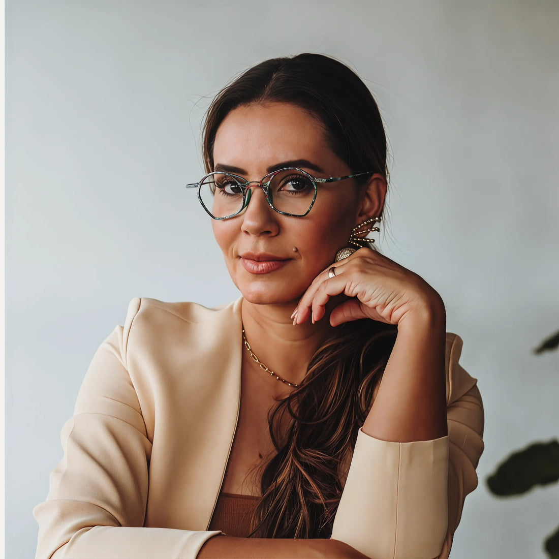 Model wearing Barledear Meadow Mosaic Green eyeglasses in a lifestyle portrait