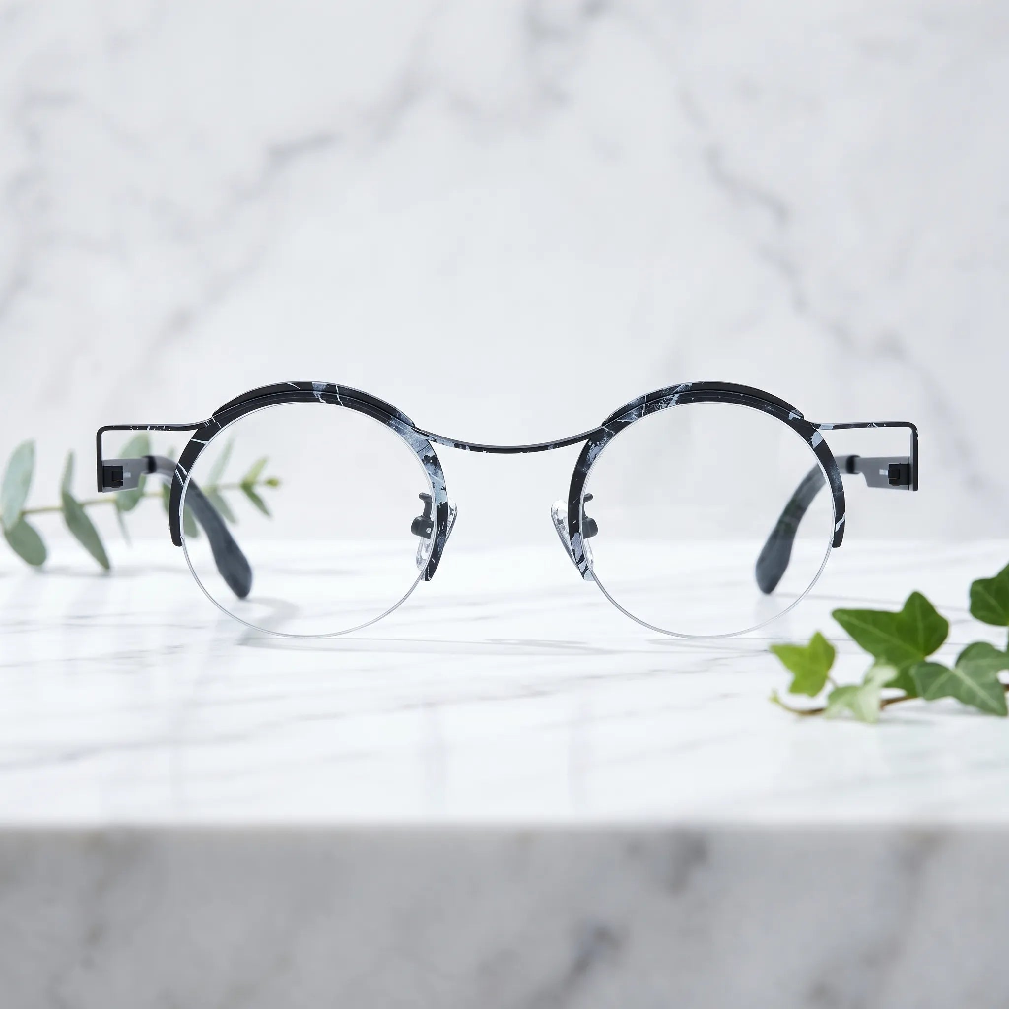 Barledear Midnight Marble eyeglasses shown in a clean lifestyle front view with black white artistic frame details