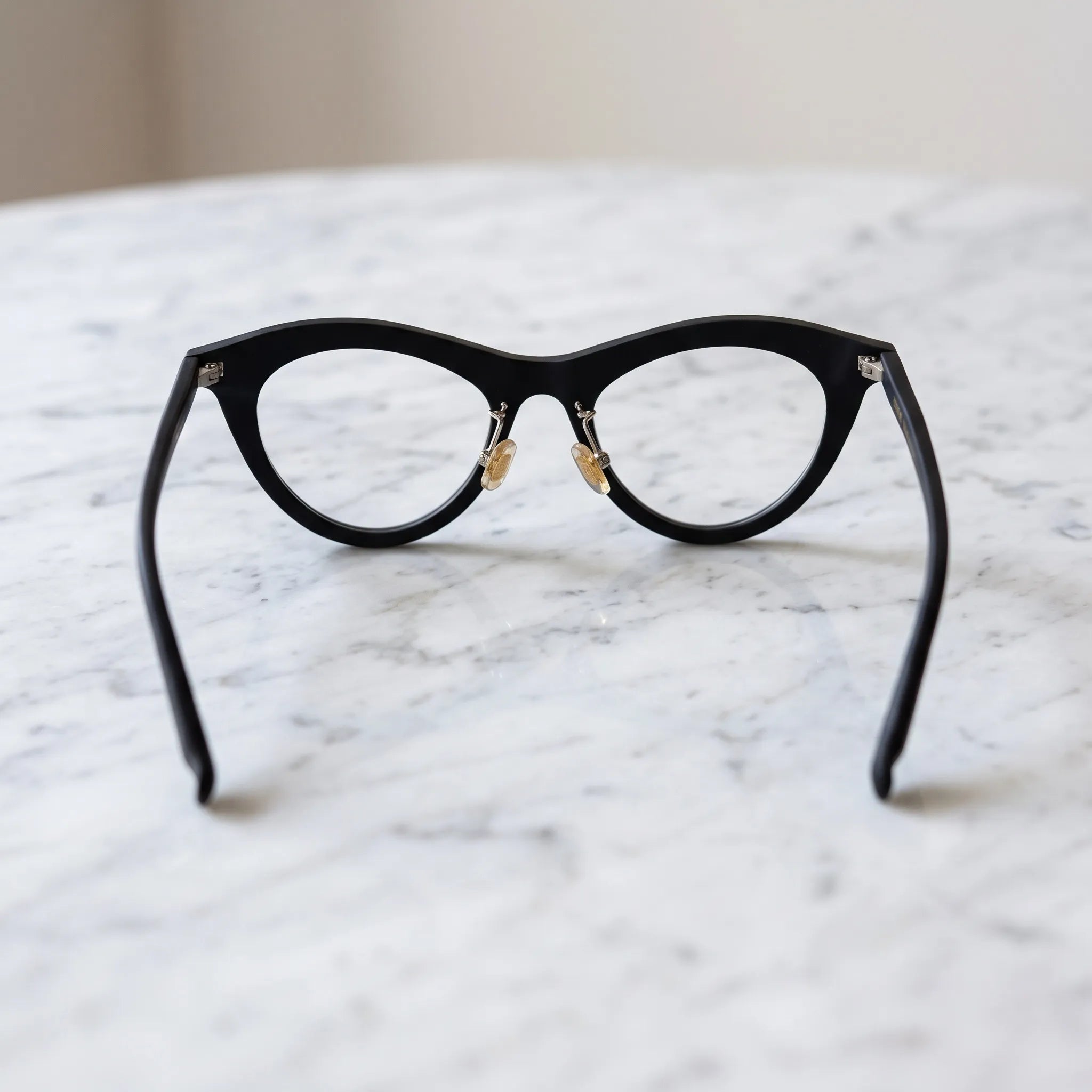 Barledear Midnight Matte cat-eye eyeglasses back view showing the full-rim construction, nose pad arms, and temple shape