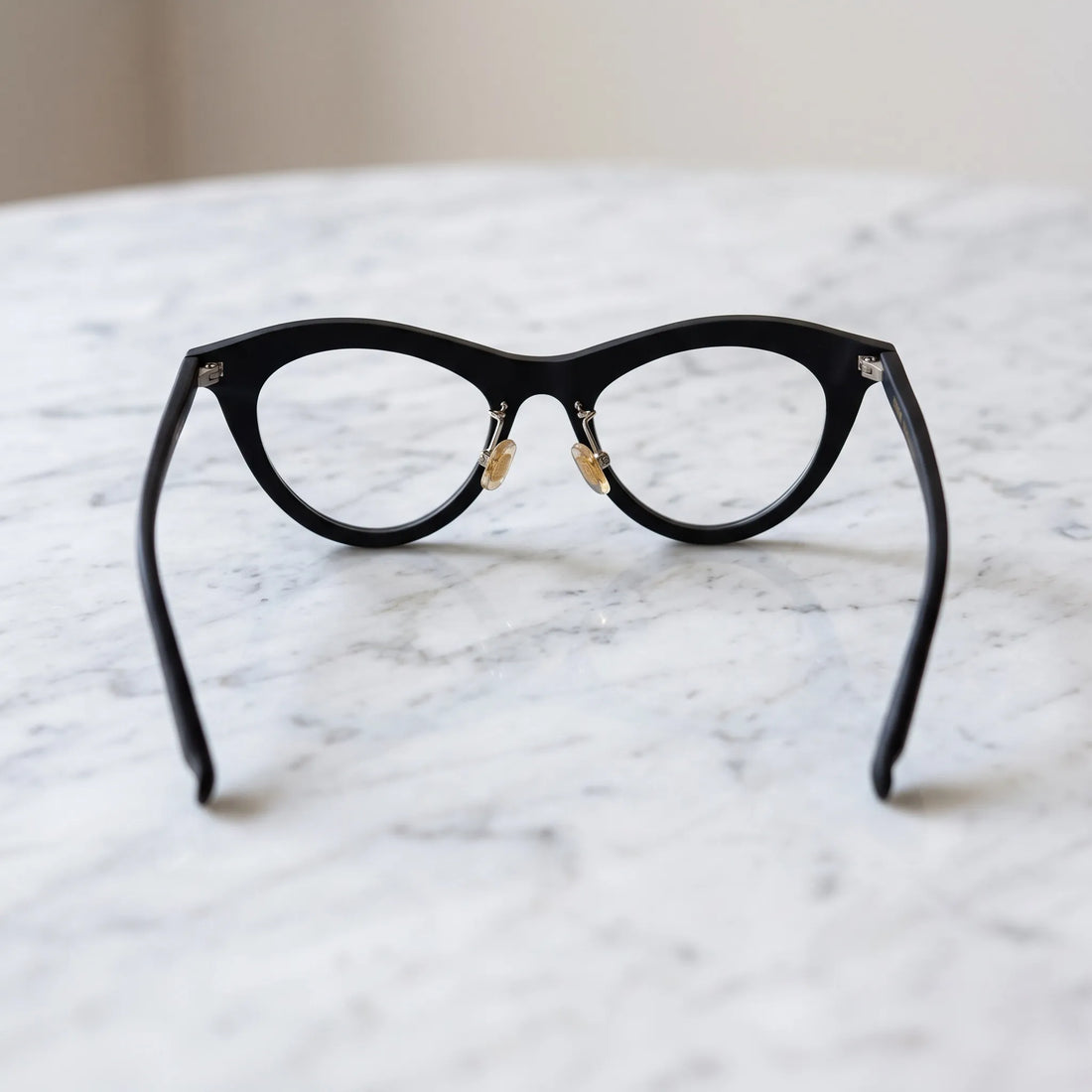 Barledear Midnight Matte cat-eye eyeglasses back view showing the full-rim construction, nose pad arms, and temple shape