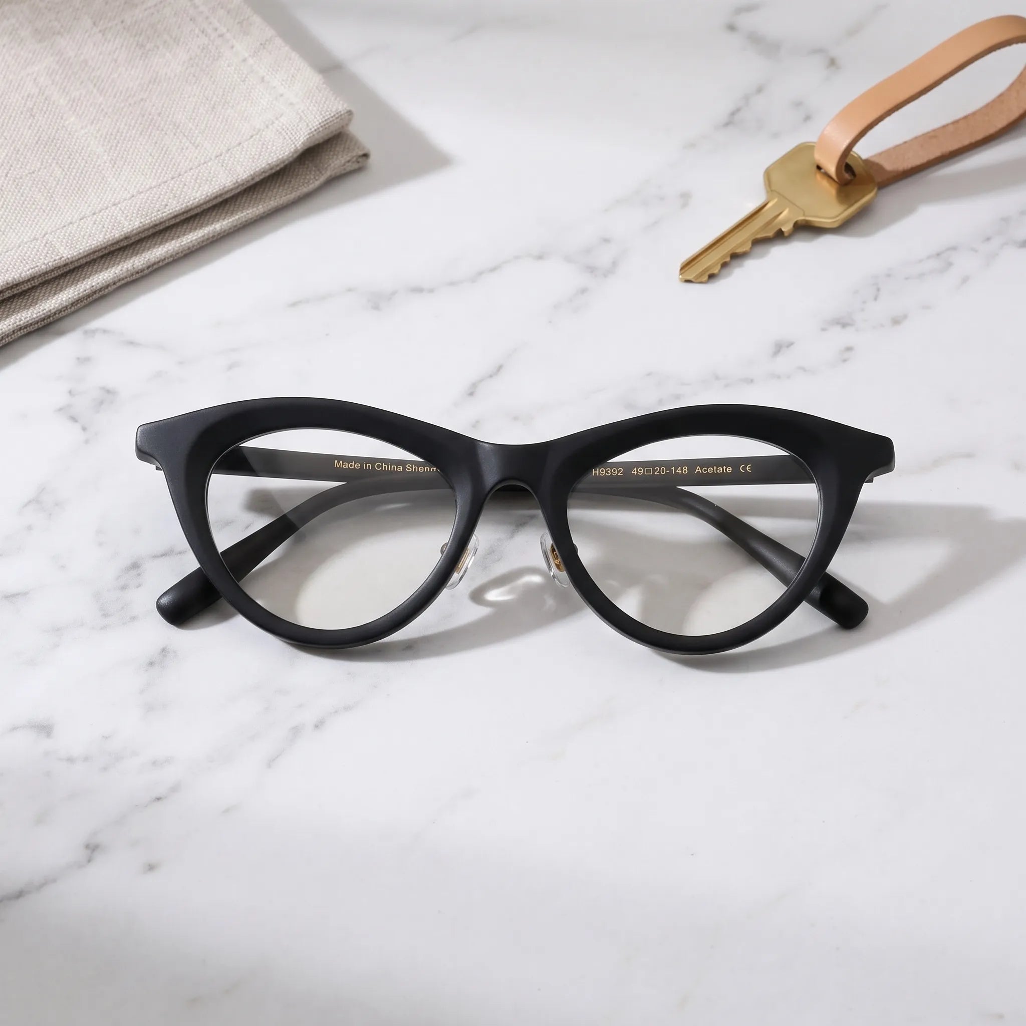 Barledear Midnight Matte cat-eye eyeglasses folded display showing the matte black frame and slim temples