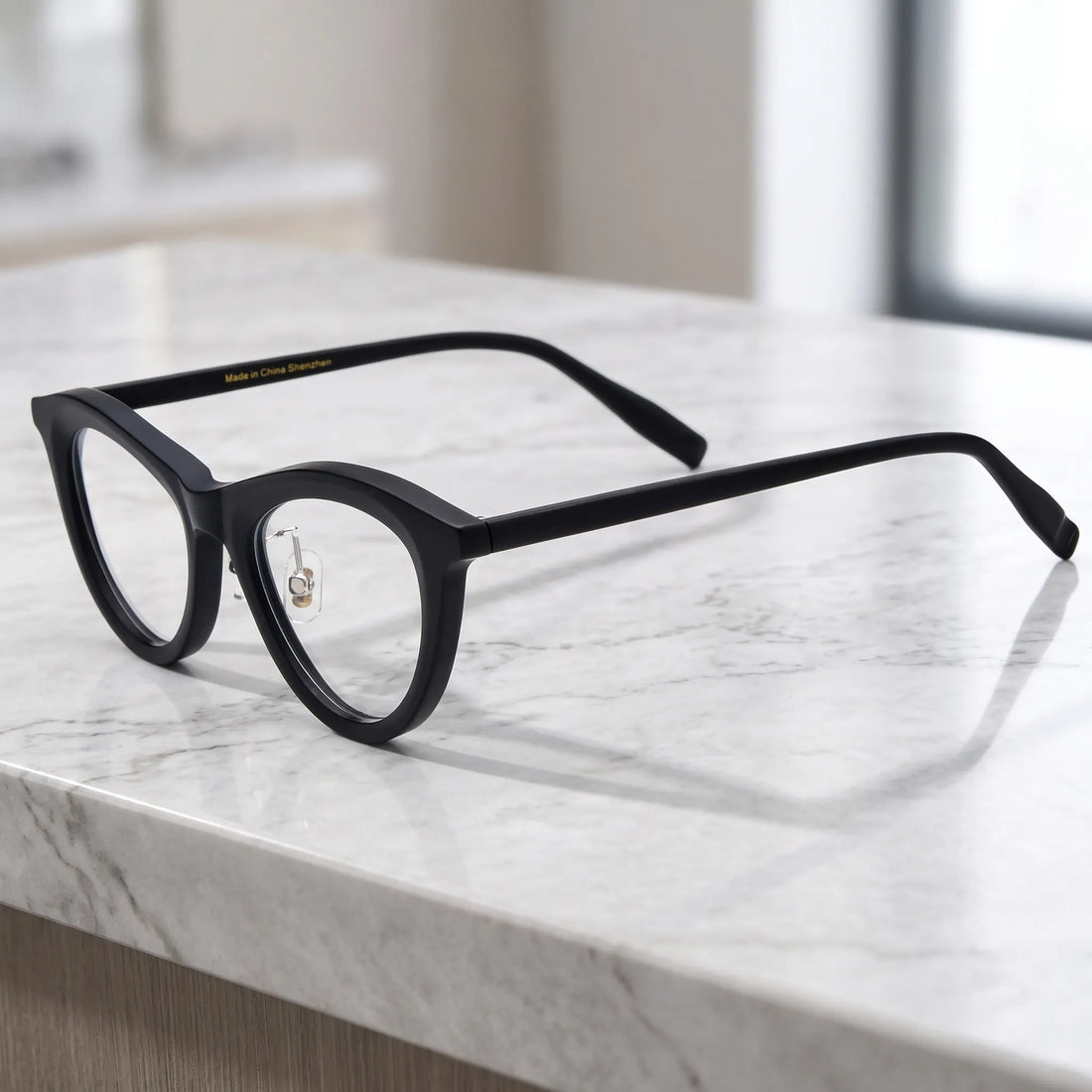 Barledear Midnight Matte cat-eye acetate eyeglasses angled side view showing the slim black temples and adjustable nose pads