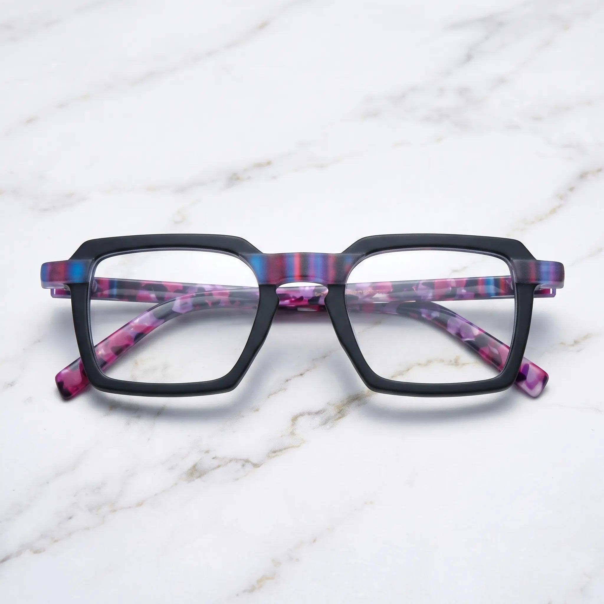 Barledear Midnight Orchid eyeglasses folded display showing the matte black frame and purple patterned temples