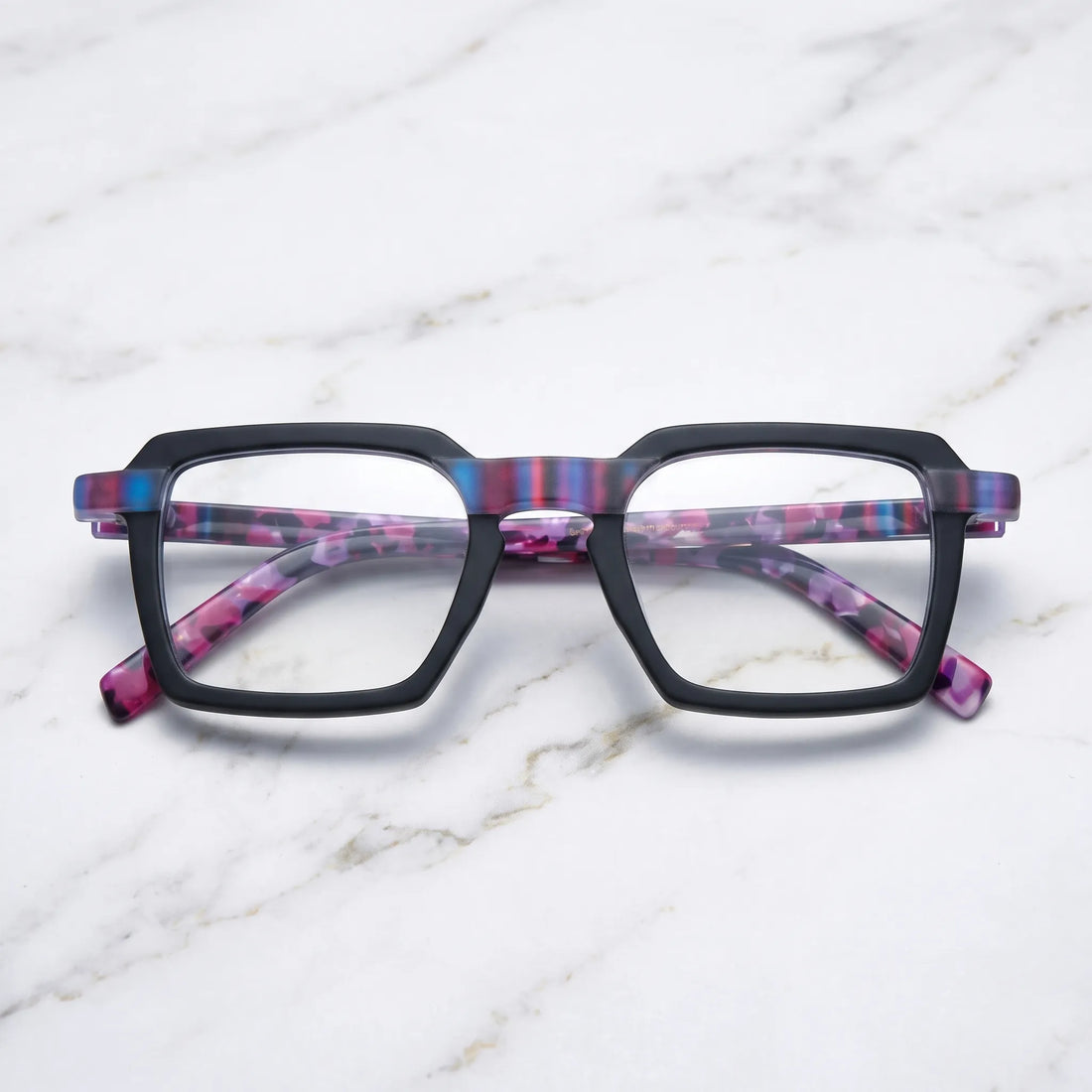 Barledear Midnight Orchid eyeglasses folded display showing the matte black frame and purple patterned temples