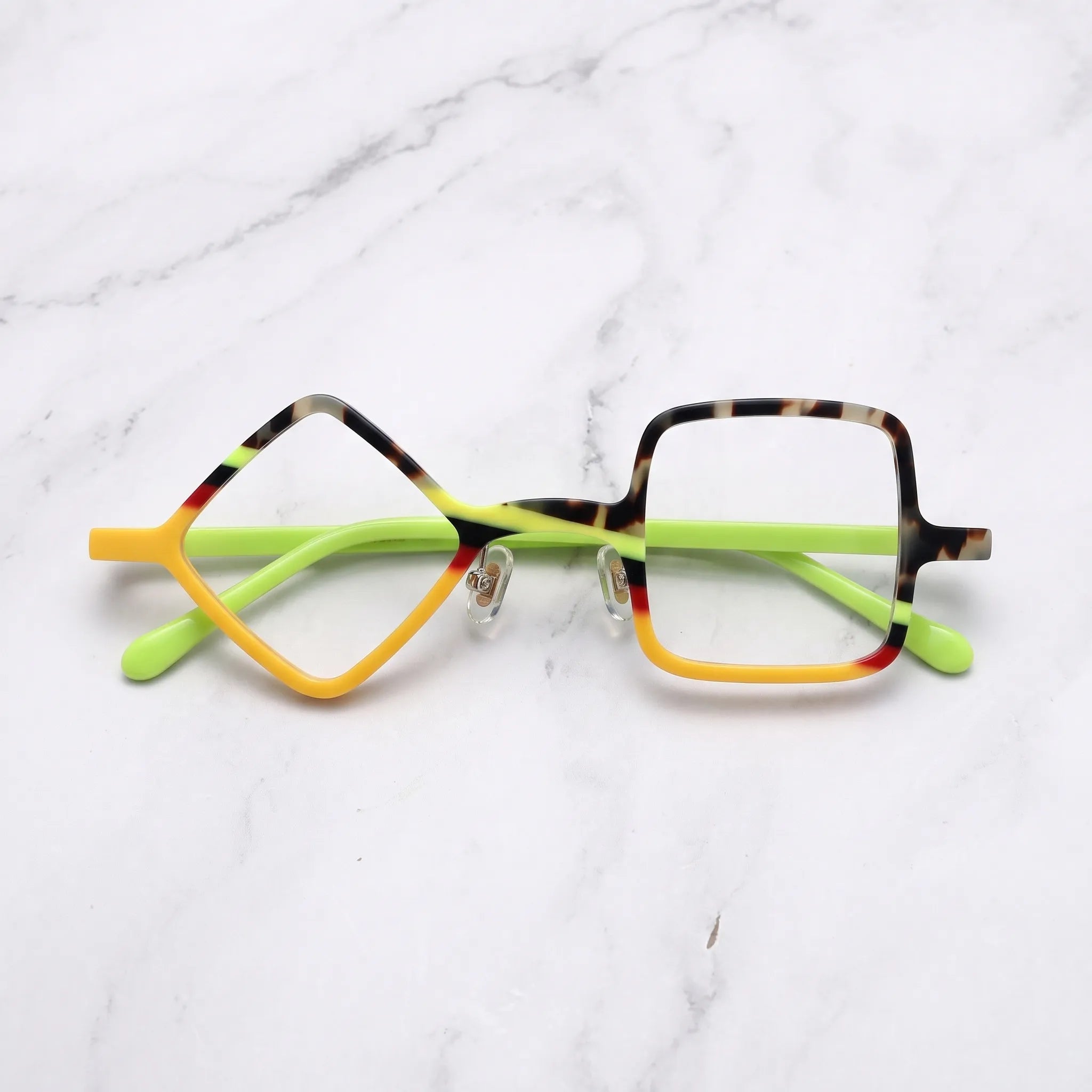 Barledear Neon Tortoise asymmetric geometric acetate eyeglasses folded display showing the tortoiseshell front, adjustable nose pads, and neon-lime temples.