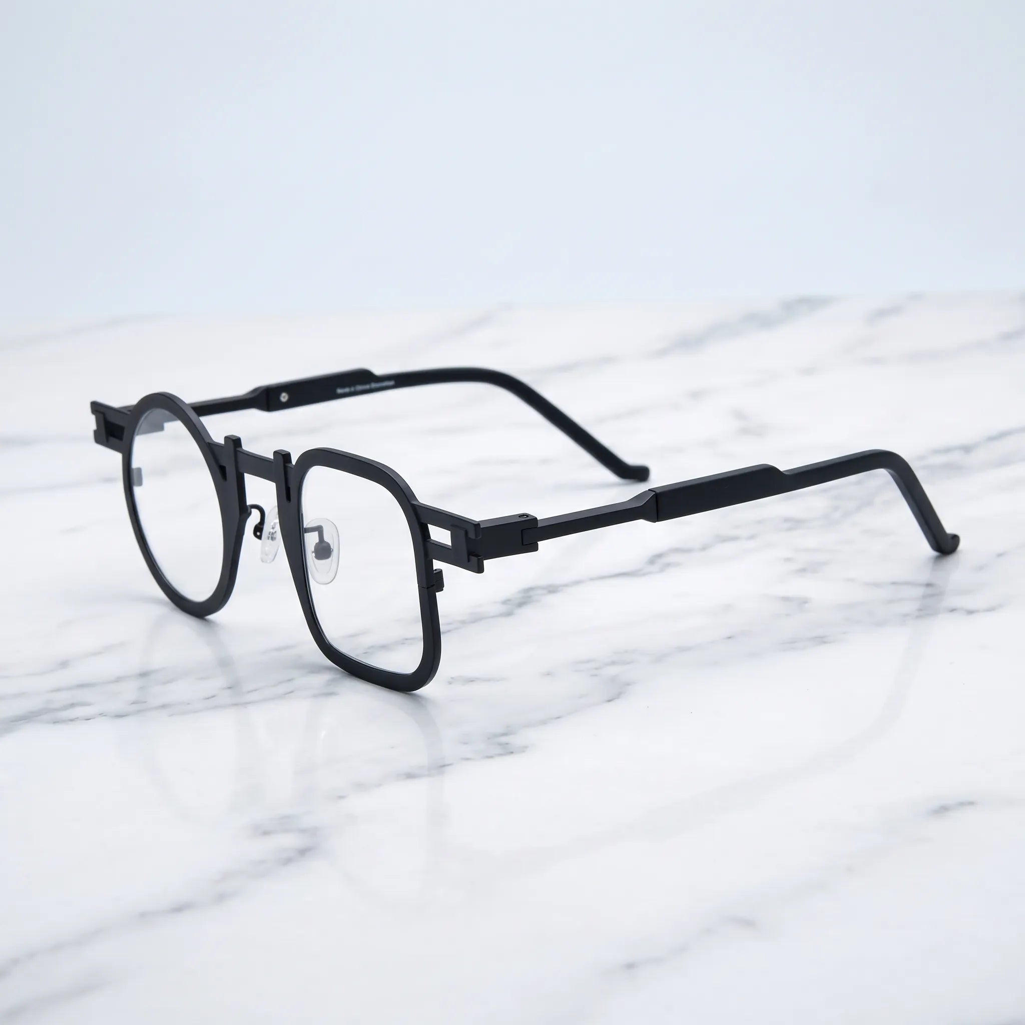 Barledear Obsidian Black eyeglasses angled side view showing slim temples, extended side-bar detail, and adjustable nose pads