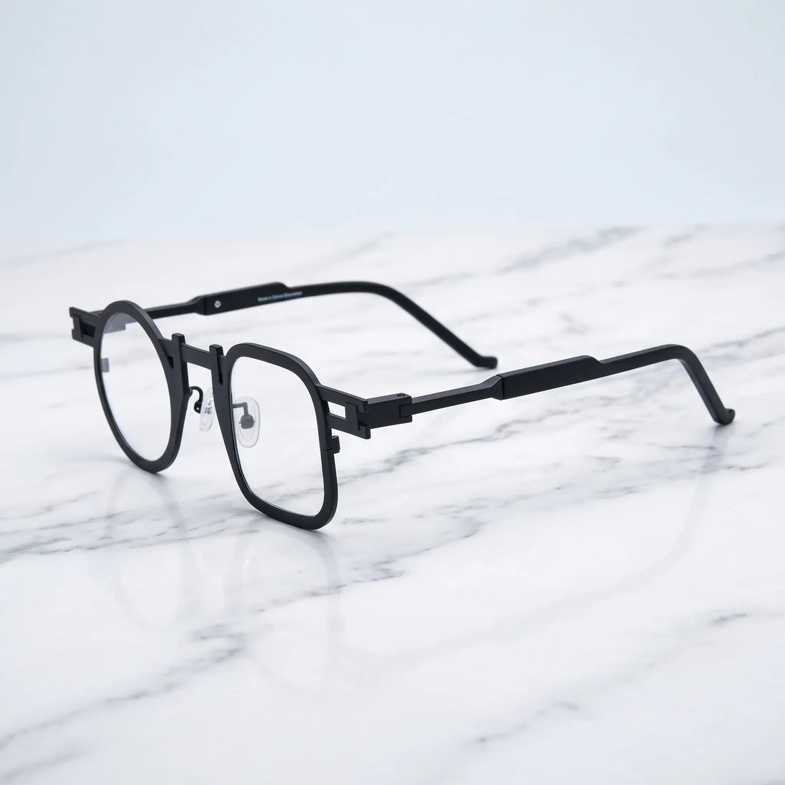 Barledear Obsidian Black eyeglasses angled side view showing slim temples, extended side-bar detail, and adjustable nose pads