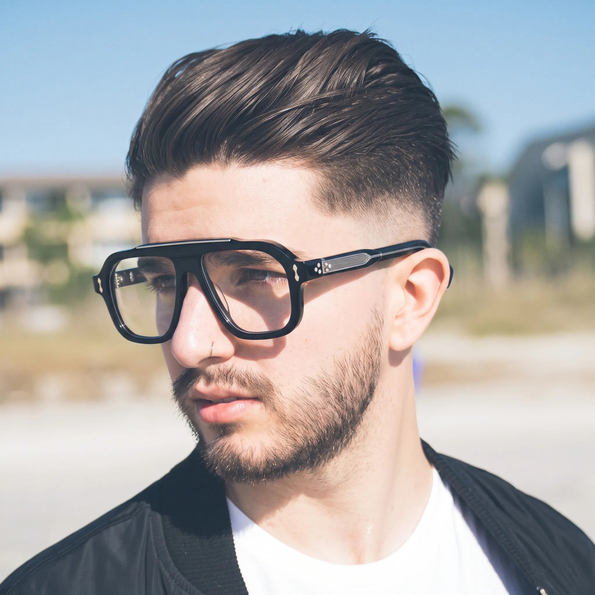 Adult model wearing Barledear Obsidian Black square aviator acetate eyeglasses for a bold monochrome statement look